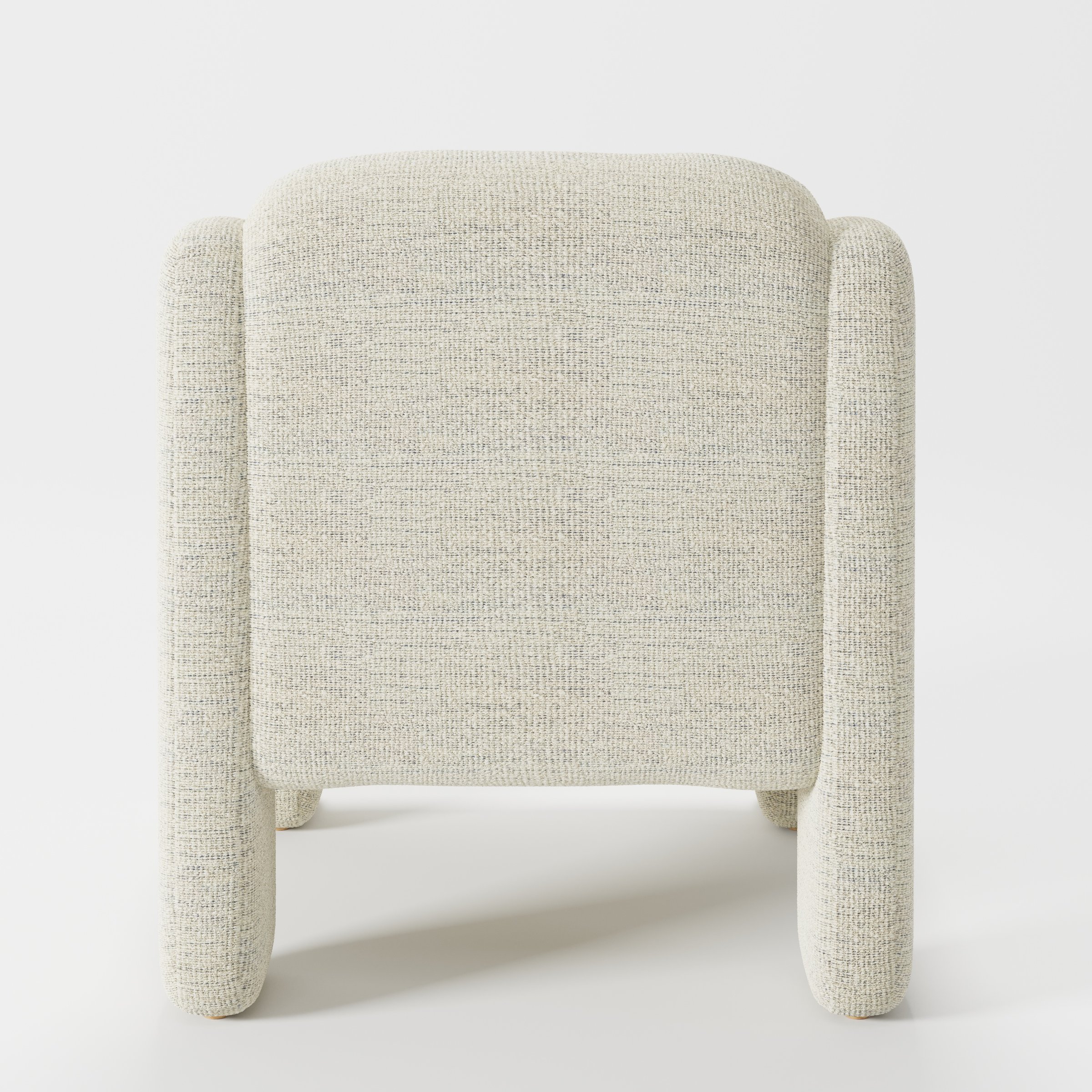 Inny armchair in Orsay Boucle Cream and Marine shown from the rear highlighting curved backrest and upholstery finish.