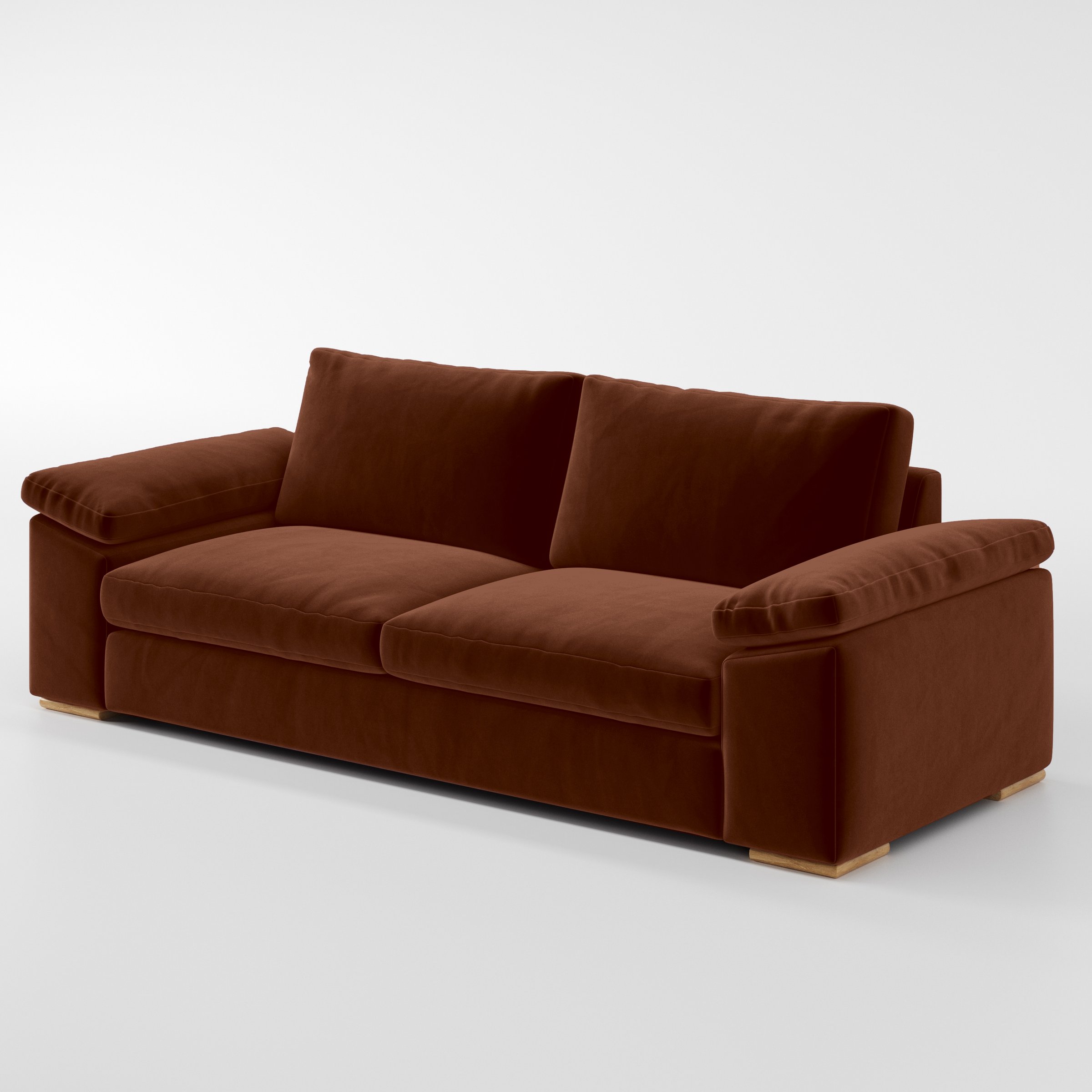 Diagonal view of the Moy sofa upholstered in Plush EasyClean Velvet in Maple.
