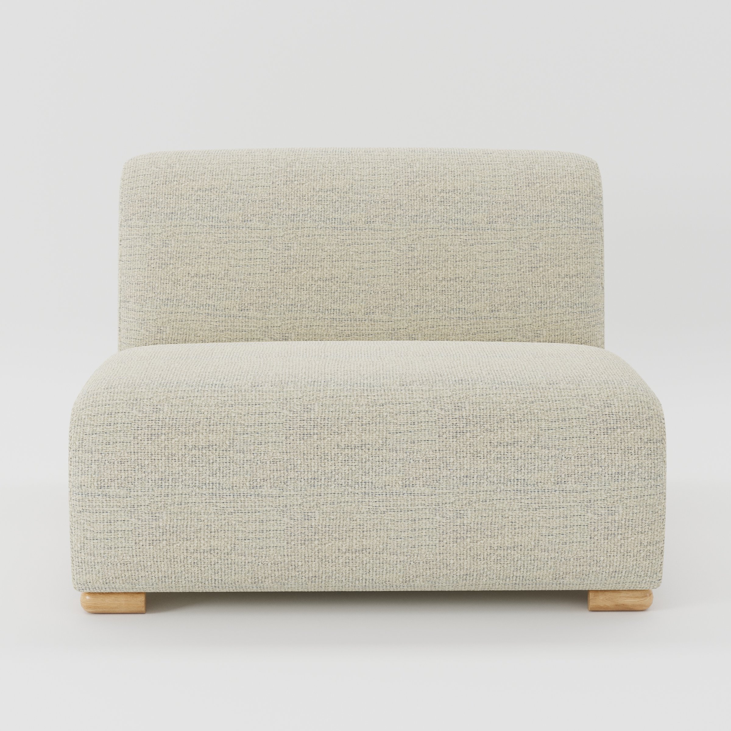 Tay single sofa unit in Orsay Bouclé Cream and Marine shown from the front with a low, armless design, deep seat and visible timber feet.