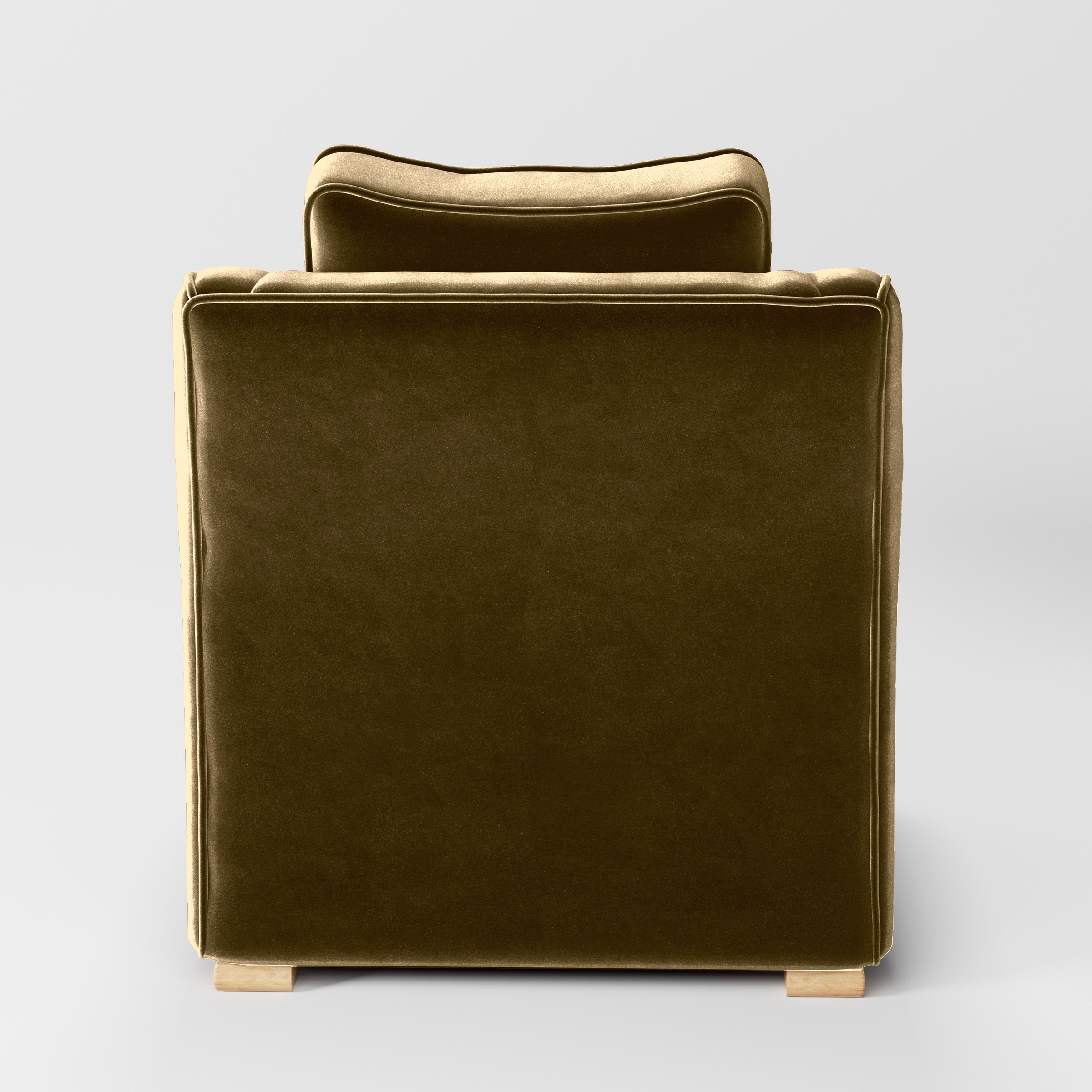 Rear view of the Cashel armchair upholstered in Plush EasyClean Velvet in Cafe.