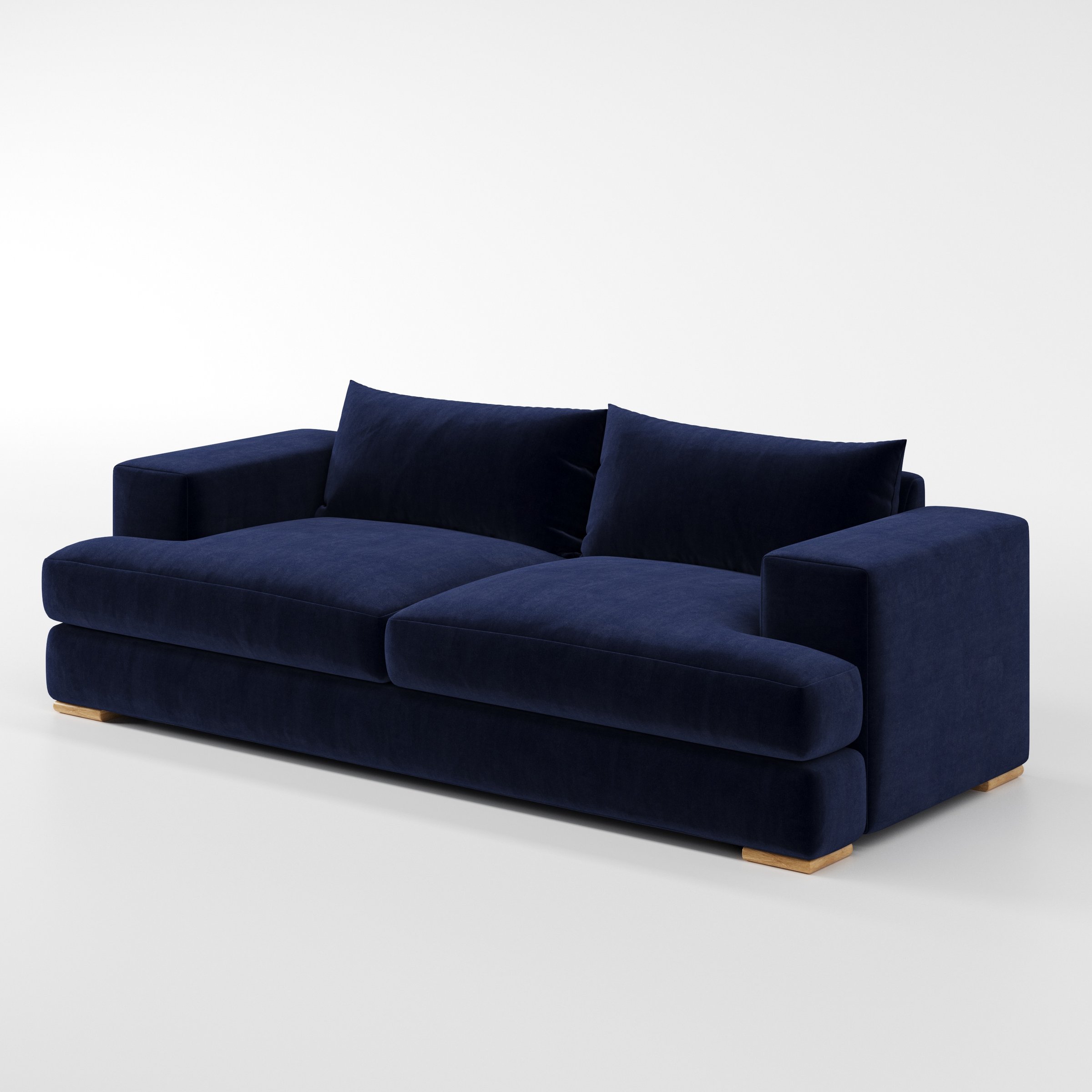 Fane sofa in Noss Velvet Navy shown at a diagonal angle highlighting arm profile and seat depth.