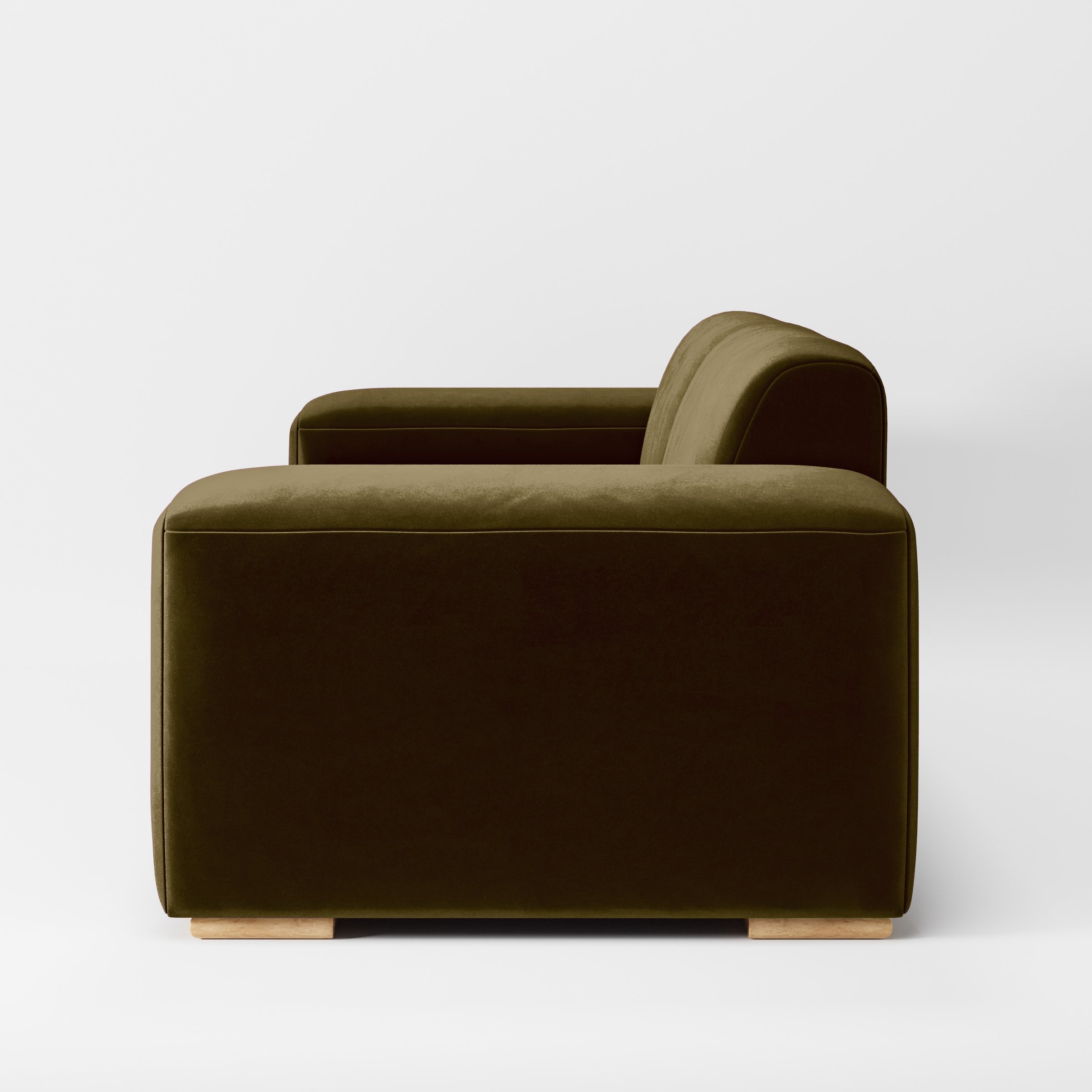Side view of the Darwell sofa upholstered in Plush EasyClean Velvet in Cedar.