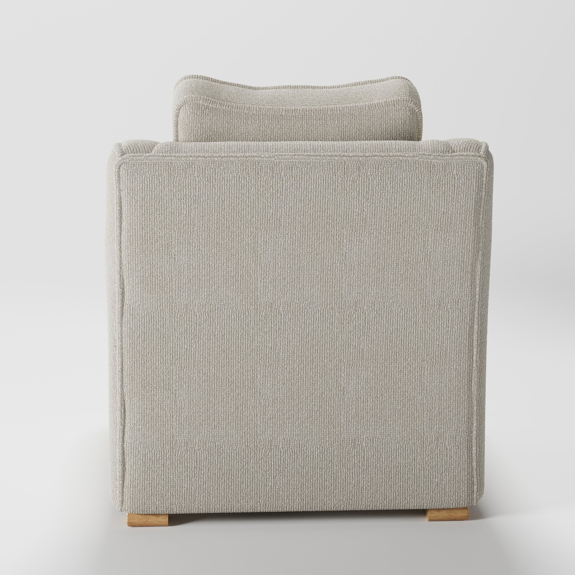 Cashel armchair in Alderney Linen Oatmeal shown from the rear highlighting backrest shape and upholstery finish.