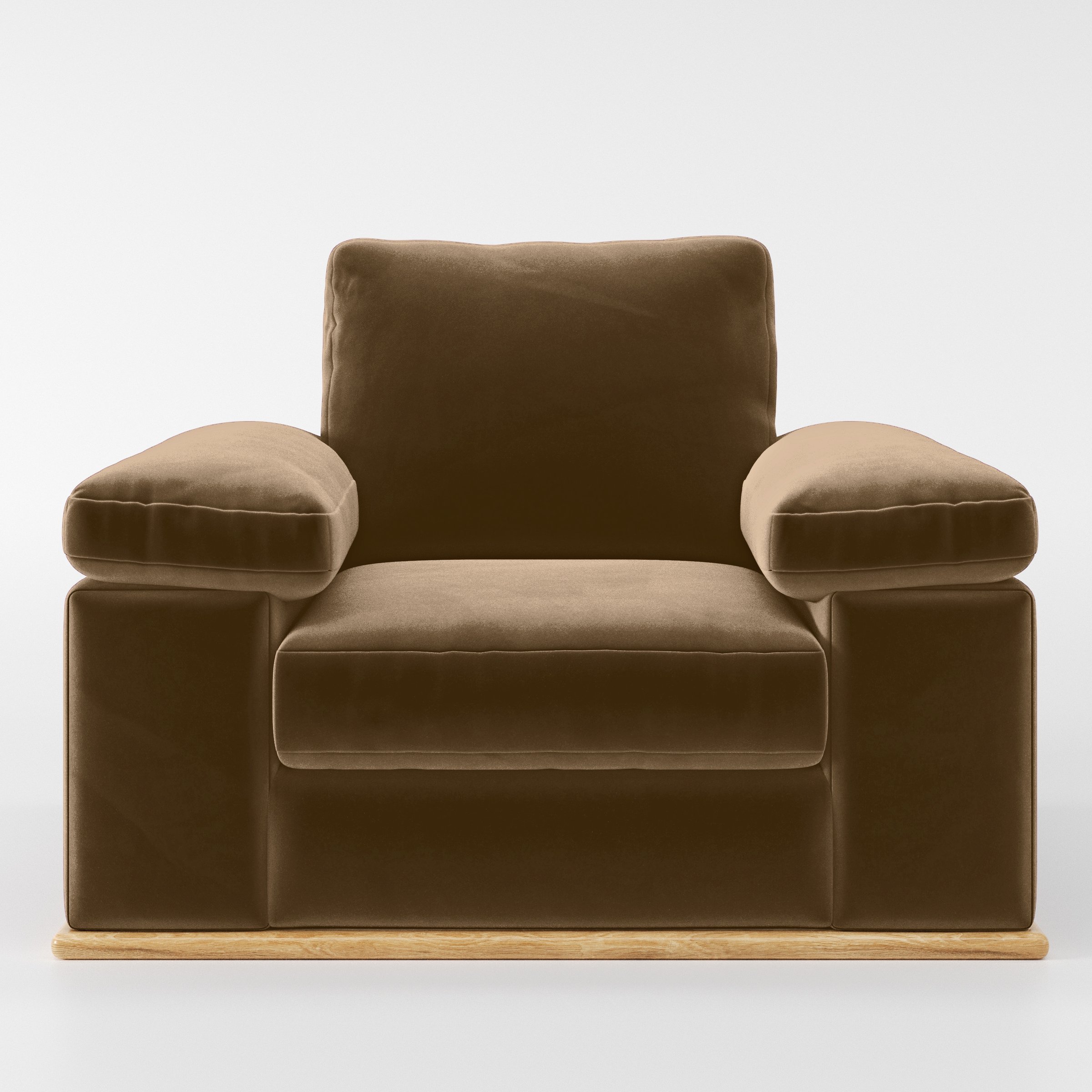 Front view of the Cusher armchair upholstered in Plush EasyClean Velvet in Caribou.