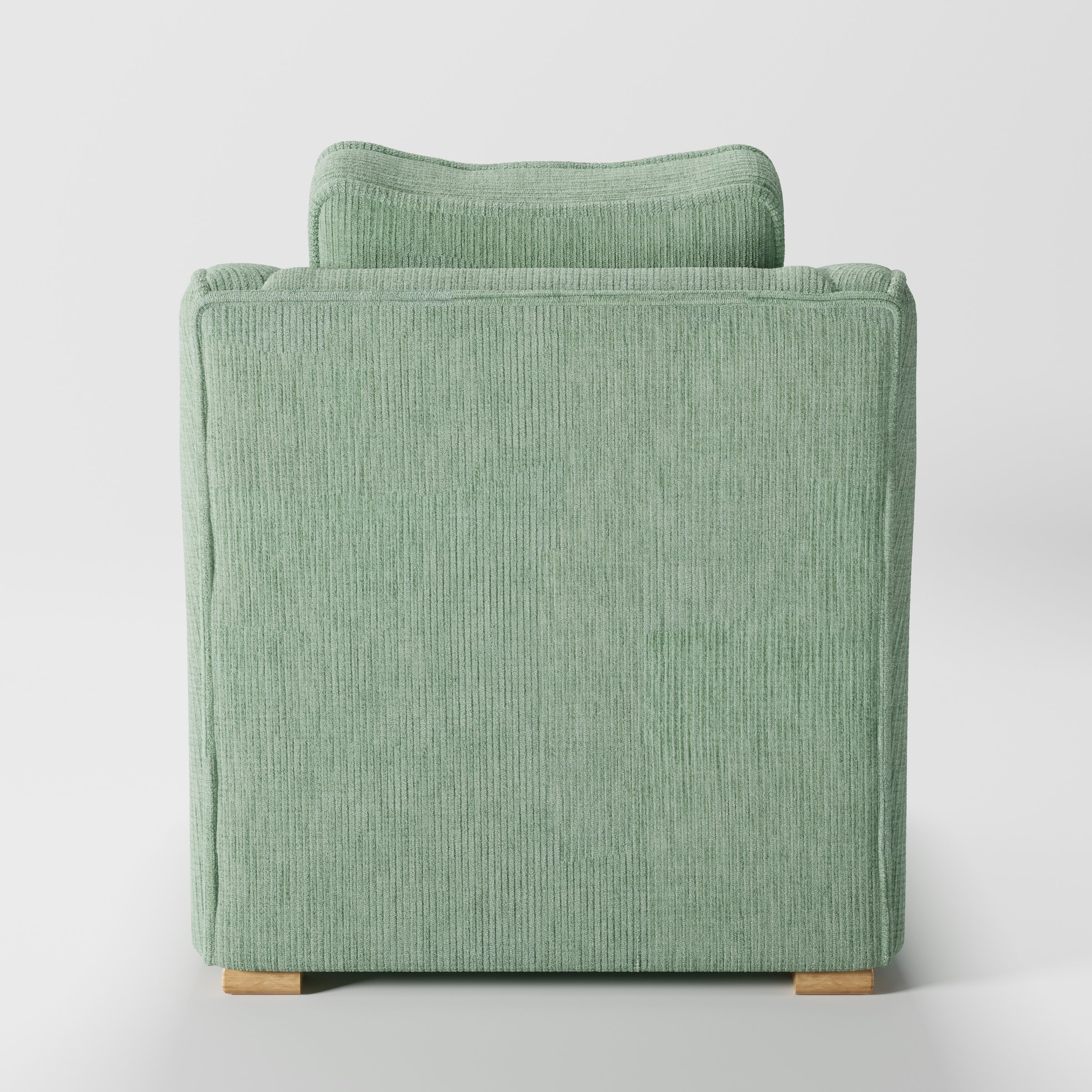 Cashel armchair in Caldey Velvet Corduroy Eucalyptus shown from the rear highlighting backrest shape and upholstery finish.