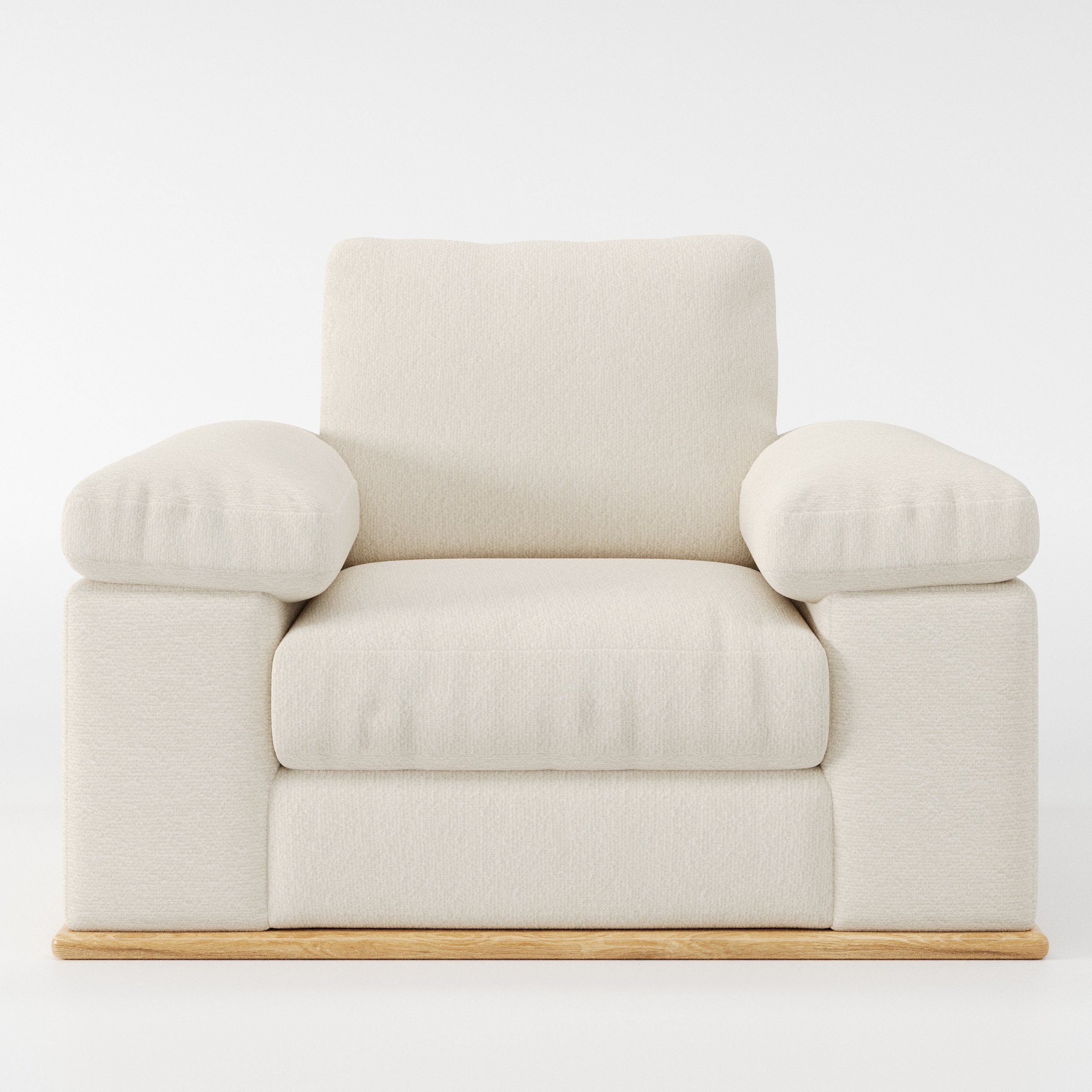 Cusher armchair in Kilda Boucle Cream shown front-on against a neutral studio backdrop.