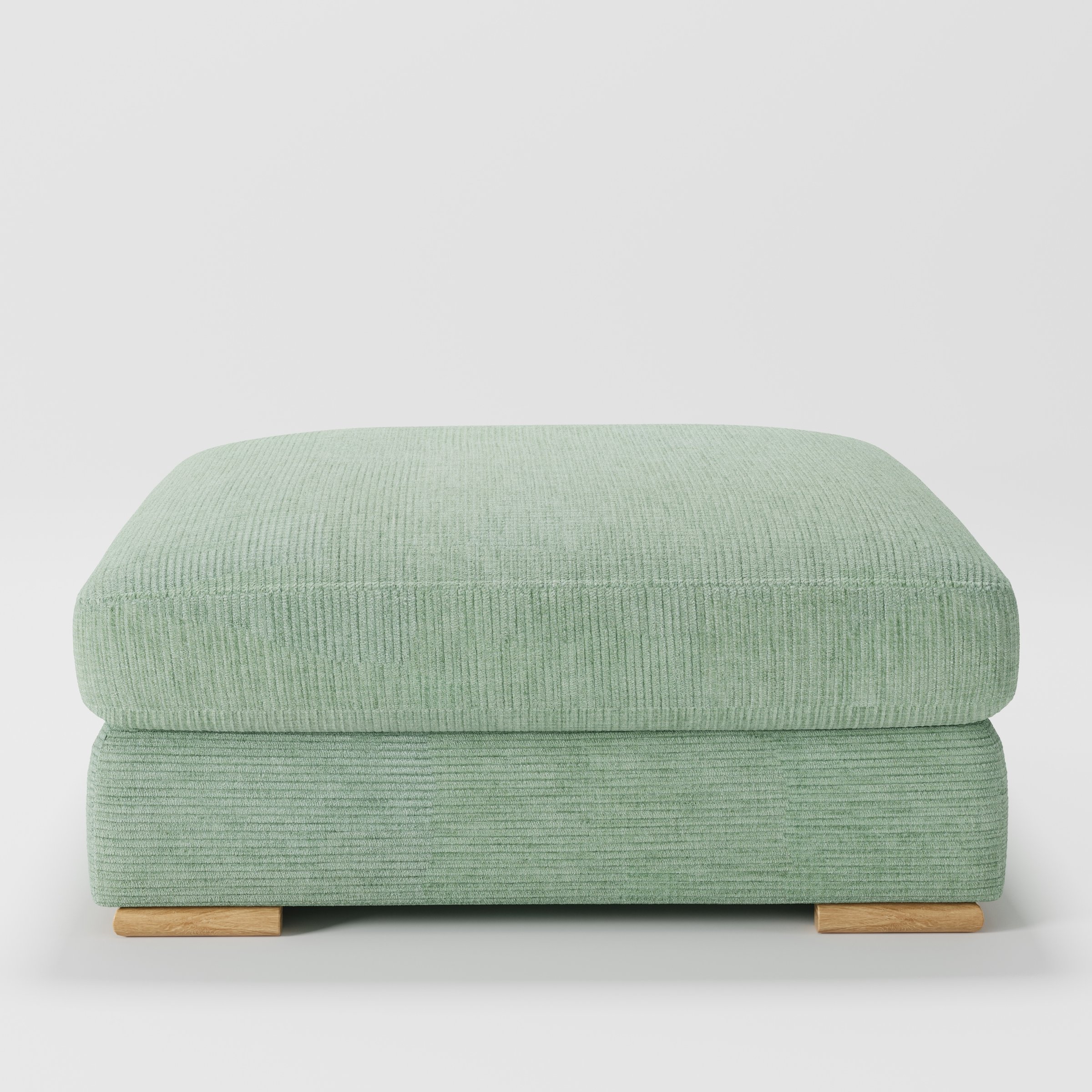 Olton footstool in Caldey Velvet Corduroy Eucalyptus shown front-on against a neutral studio backdrop.