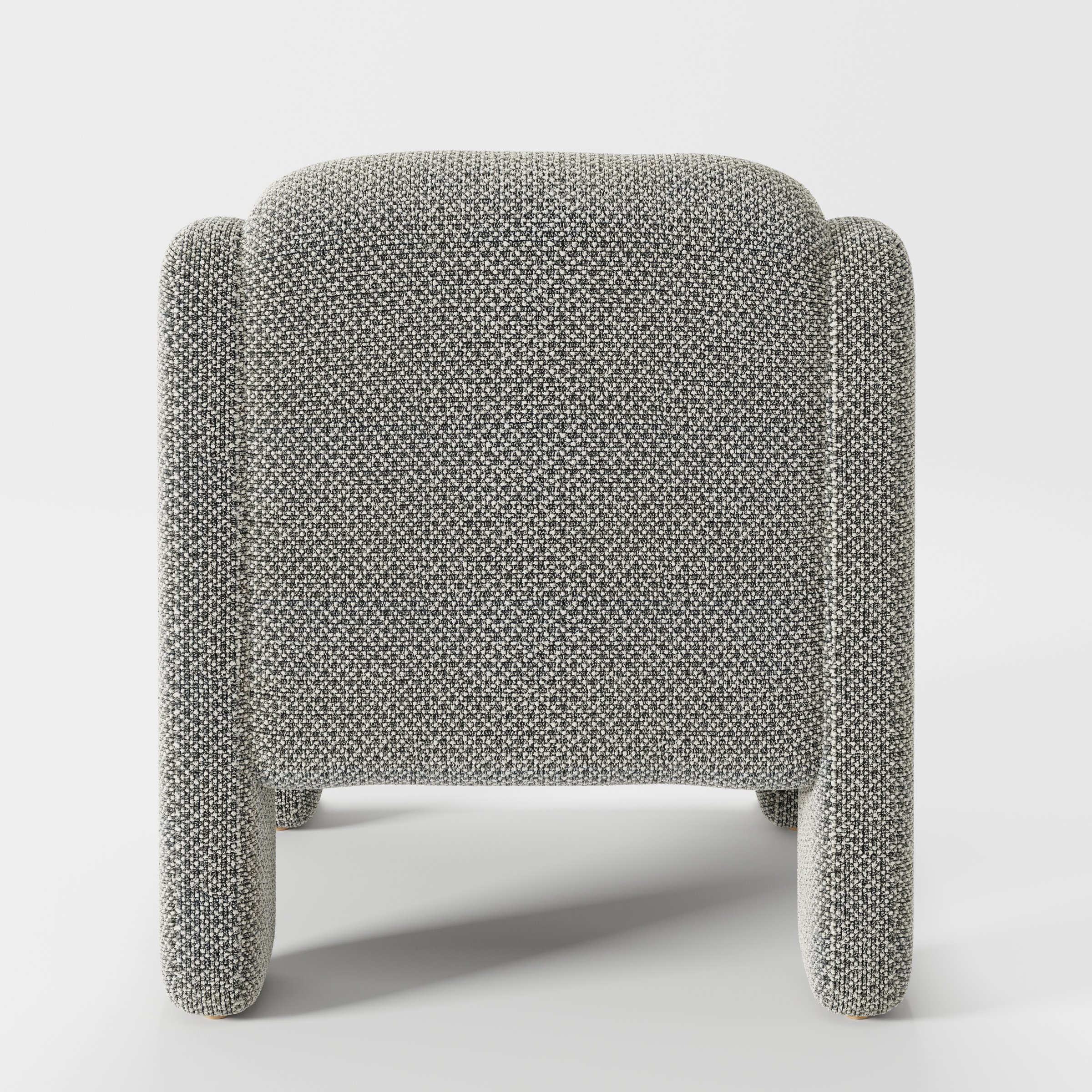 Inny armchair in Rousay Wool Blend Tar and Chalk shown from the rear highlighting curved backrest and upholstery finish.