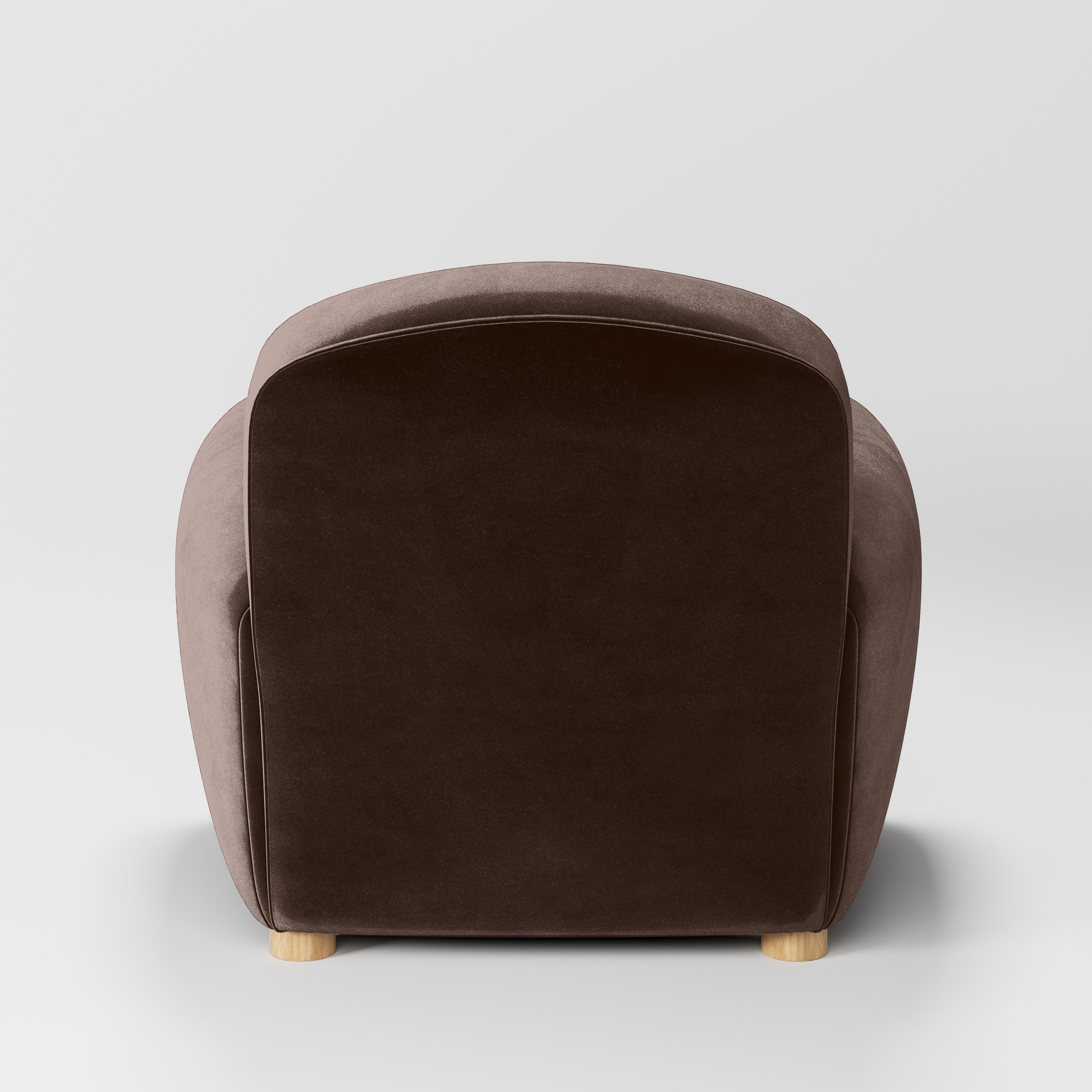 Rear view of the Fergus armchair upholstered in Plush EasyClean Velvet in Mole.