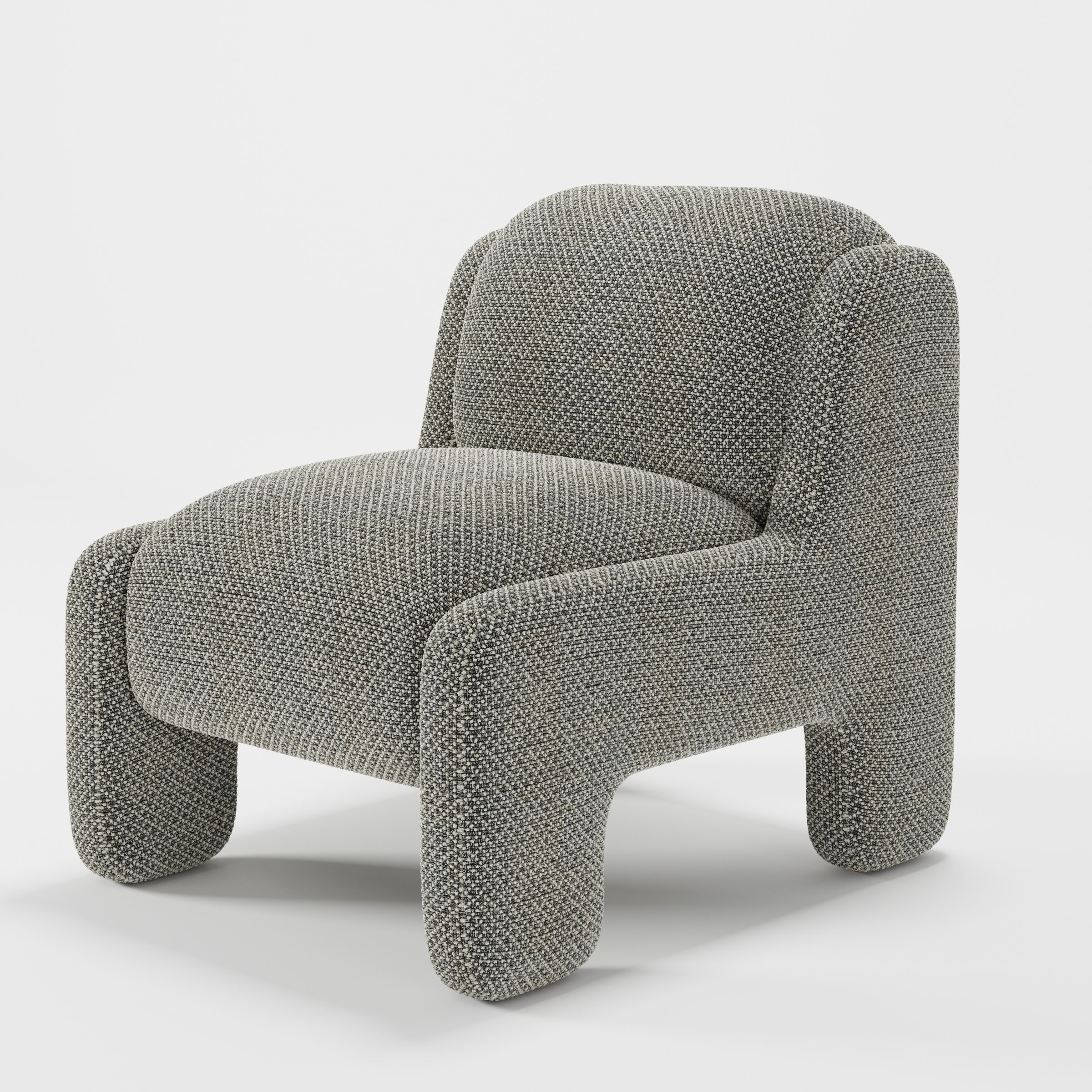Inny armchair in Rousay Wool Blend Tar and Chalk shown at a diagonal angle highlighting sculpted form and low seat.