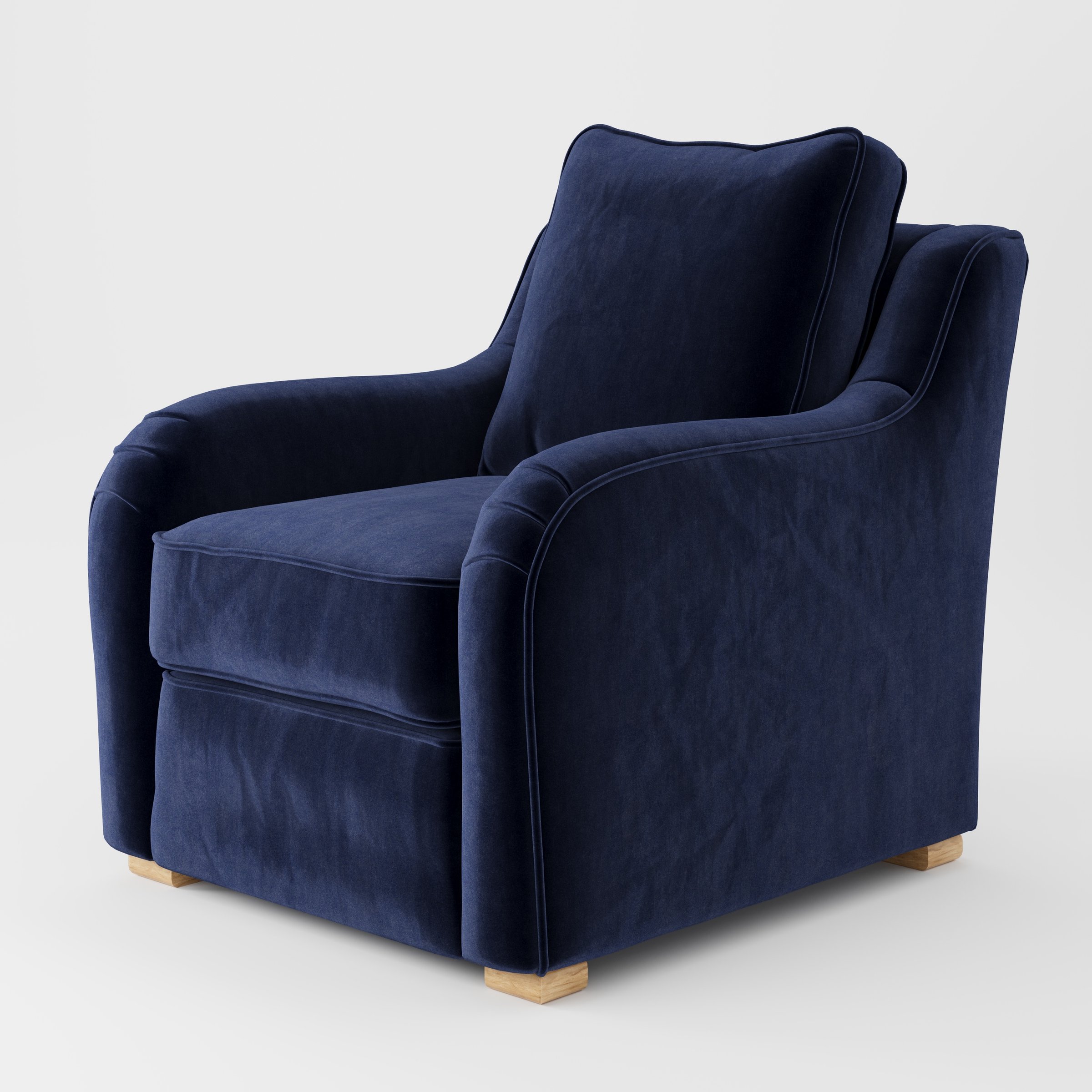 Cashel armchair in Noss Velvet Navy shown at a diagonal angle highlighting curved arms and seat depth.