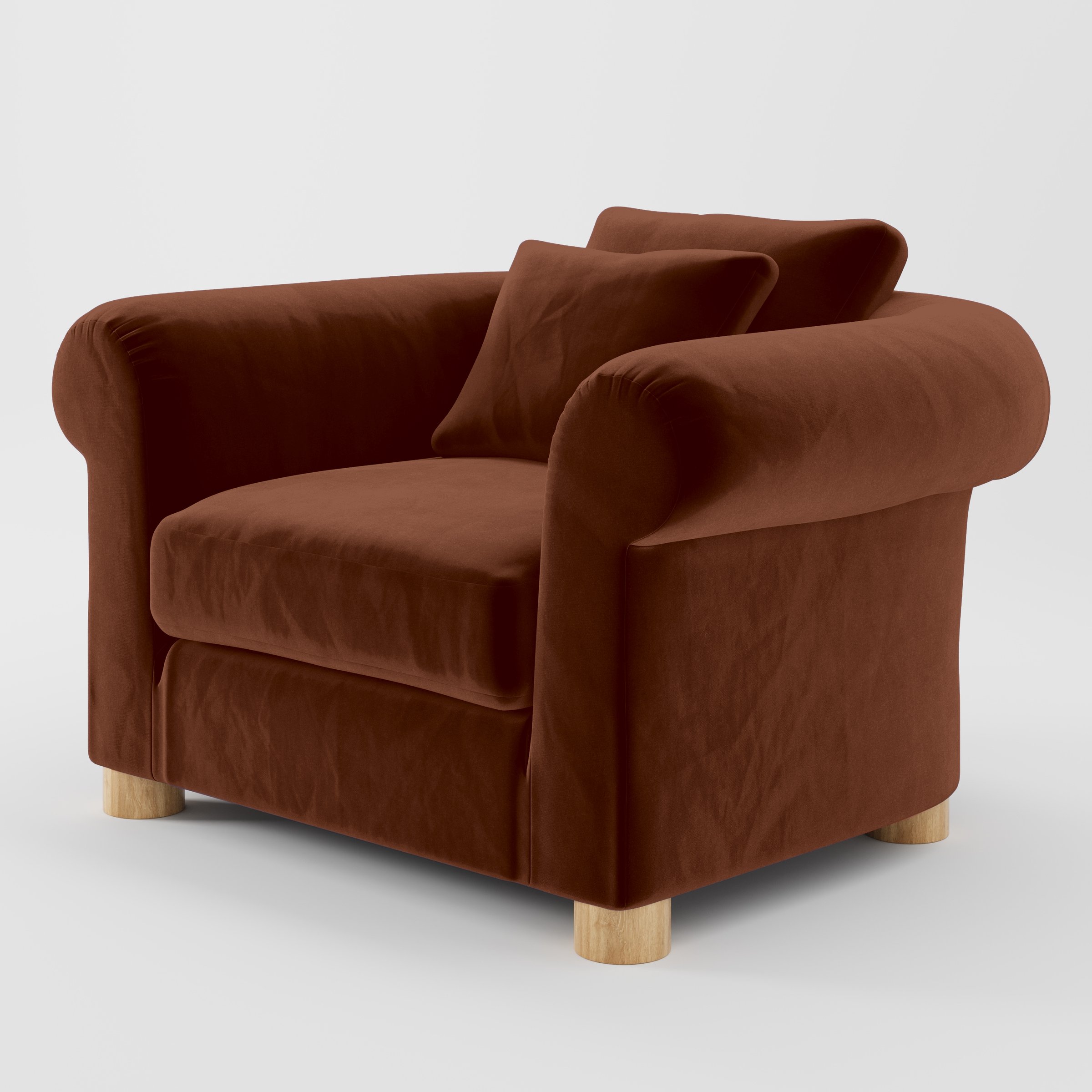 Diagonal view of the Windermere armchair upholstered in Plush EasyClean Velvet in Maple.