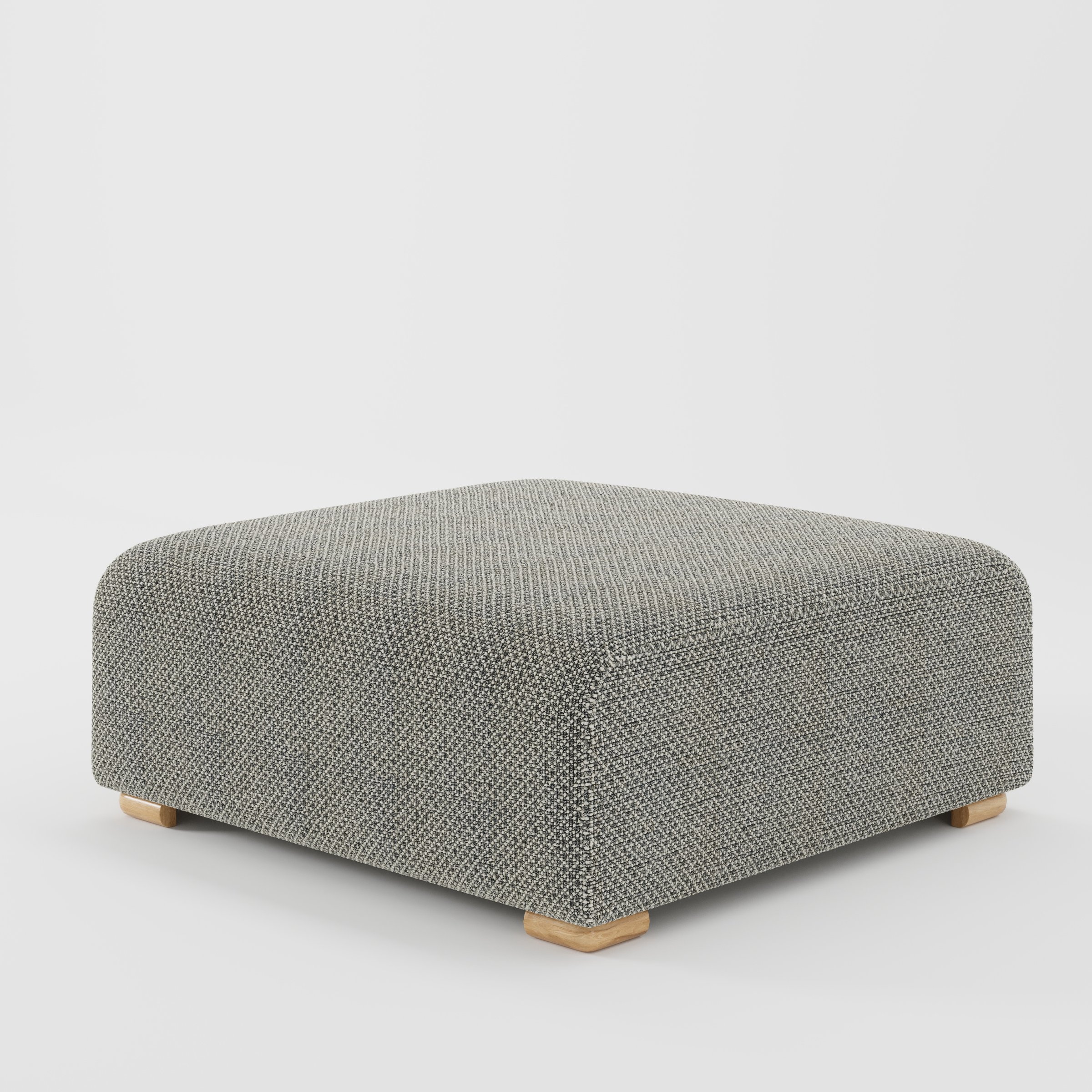 Tay footstool in Rousay Wool Blend Tar and Chalk shown at a diagonal angle highlighting clean edges and compact form.