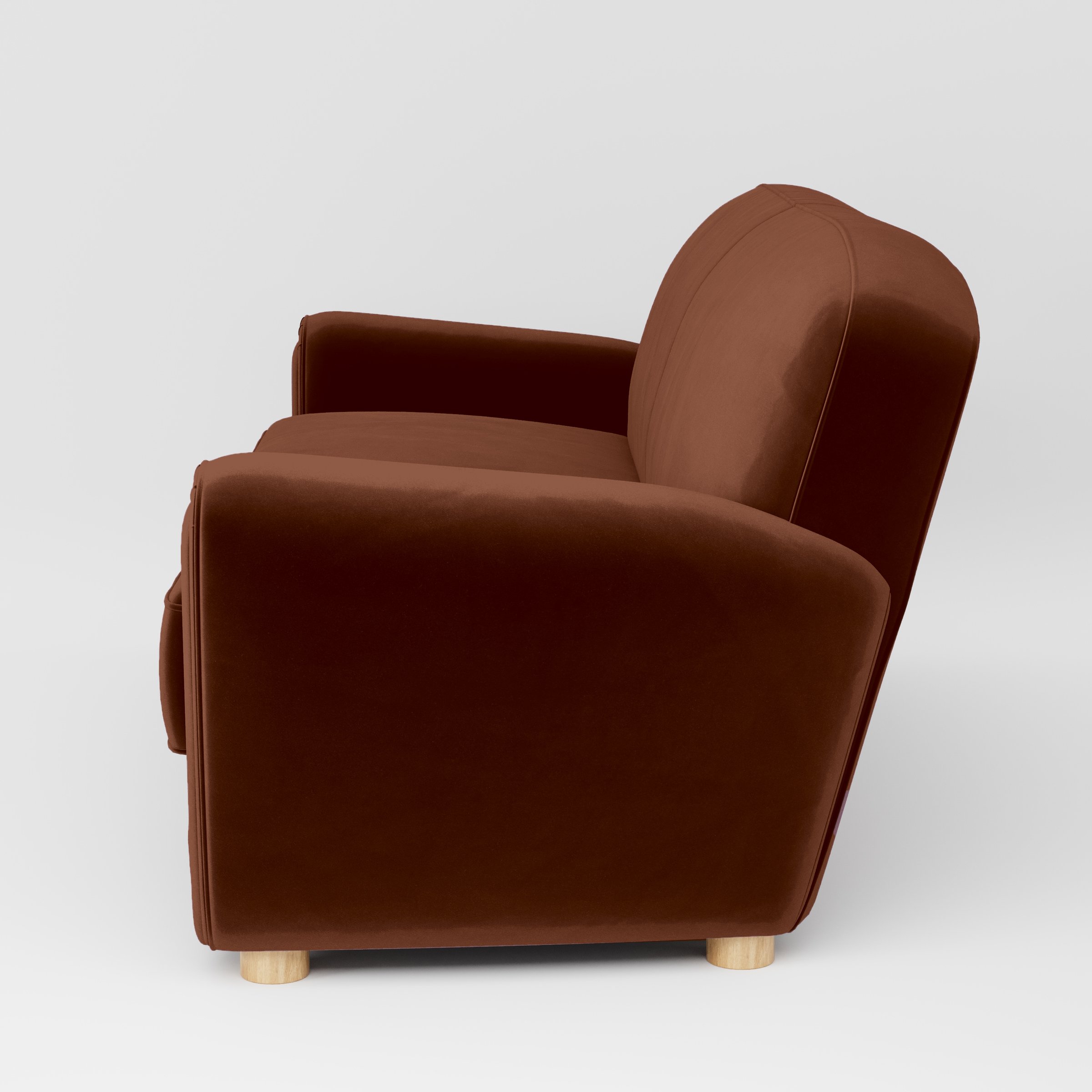 Side view of the Fergus sofa upholstered in Plush EasyClean Velvet in Maple.