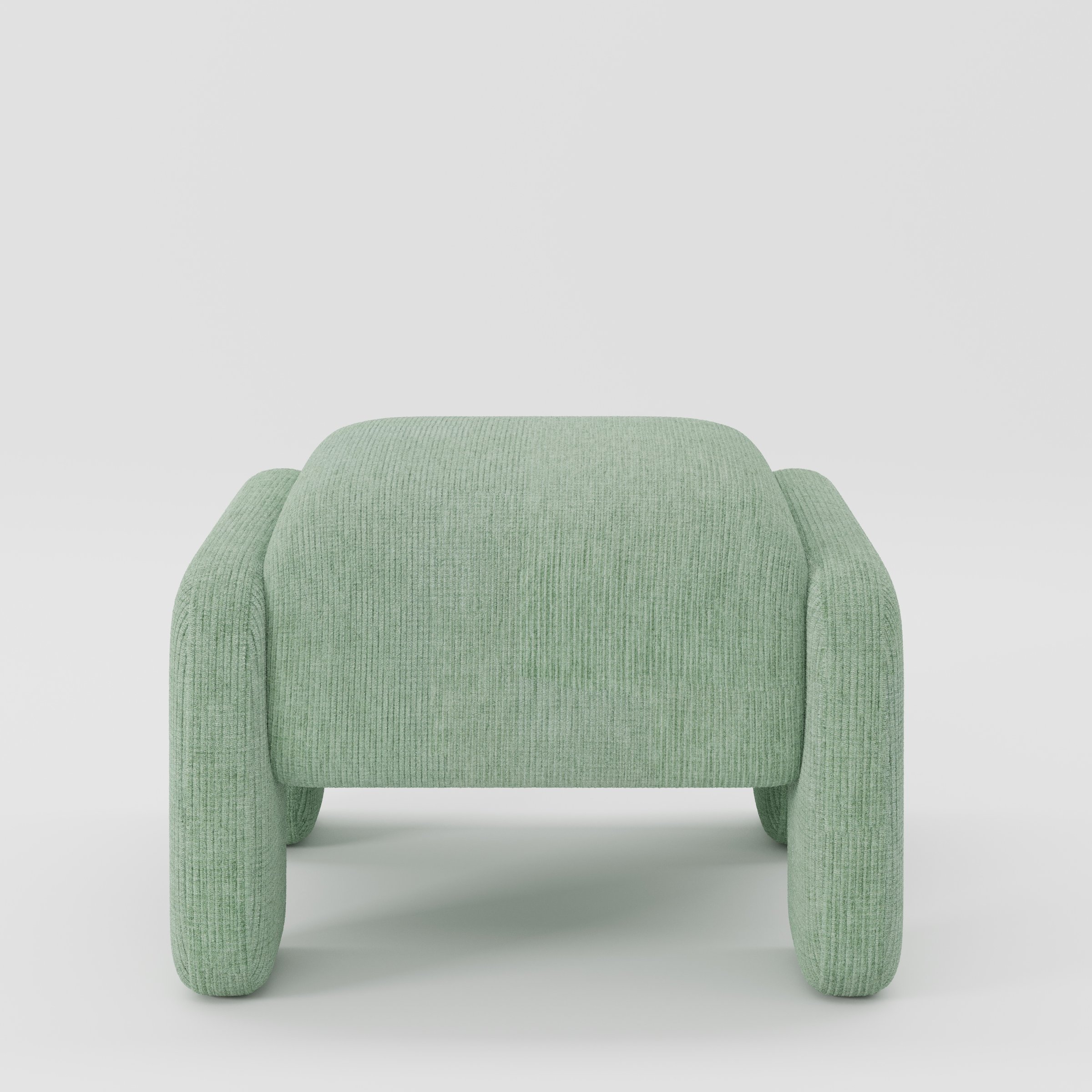 Inny footstool in Caldey velvet corduroy eucalyptus fabric, front view showing sculpted form and fine ribbed texture