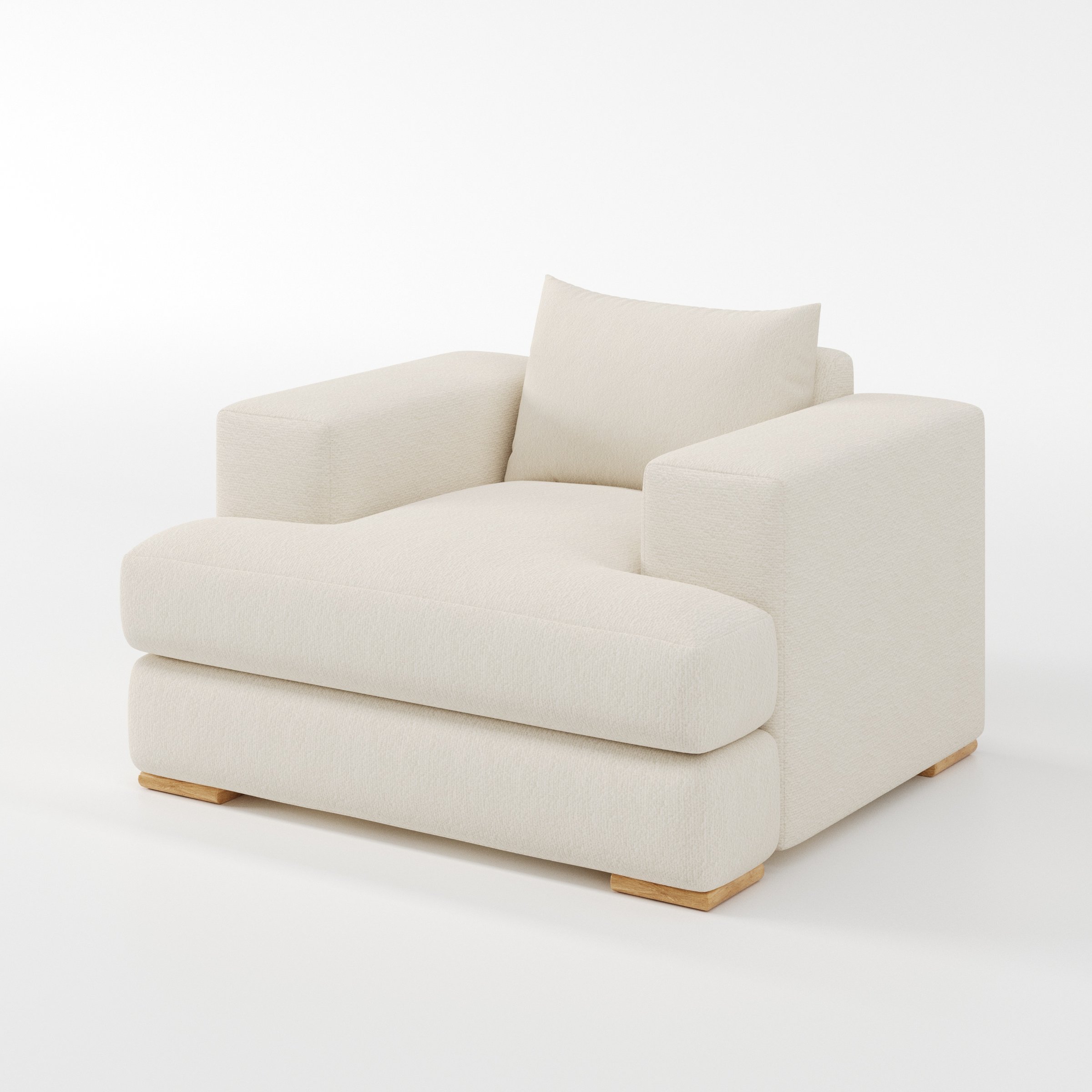 Fane armchair in Kilda Boucle Cream shown at a diagonal angle highlighting arms and seat depth.
