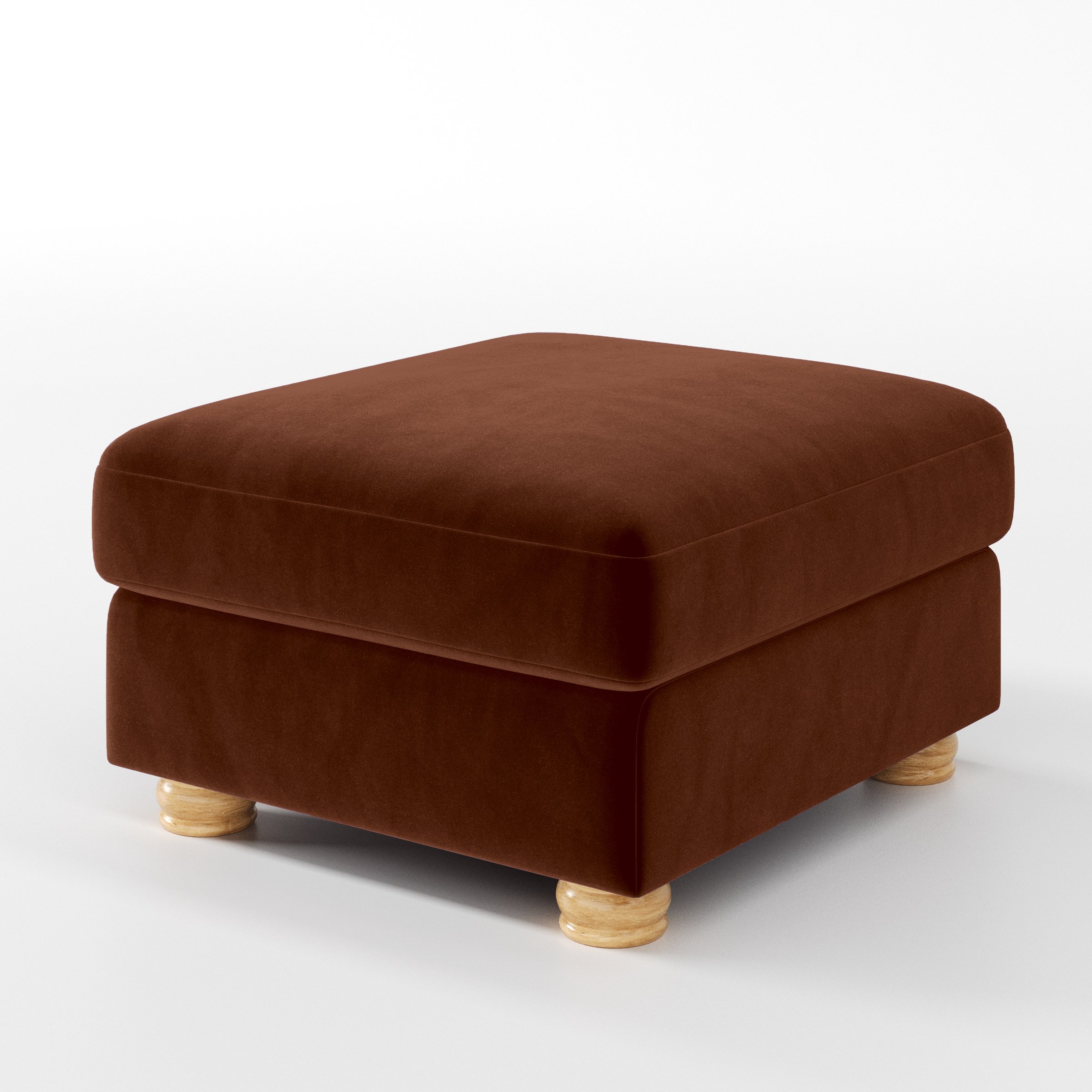 Diagonal view of the Anna Lee footstool upholstered in Plush EasyClean Velvet in Maple.