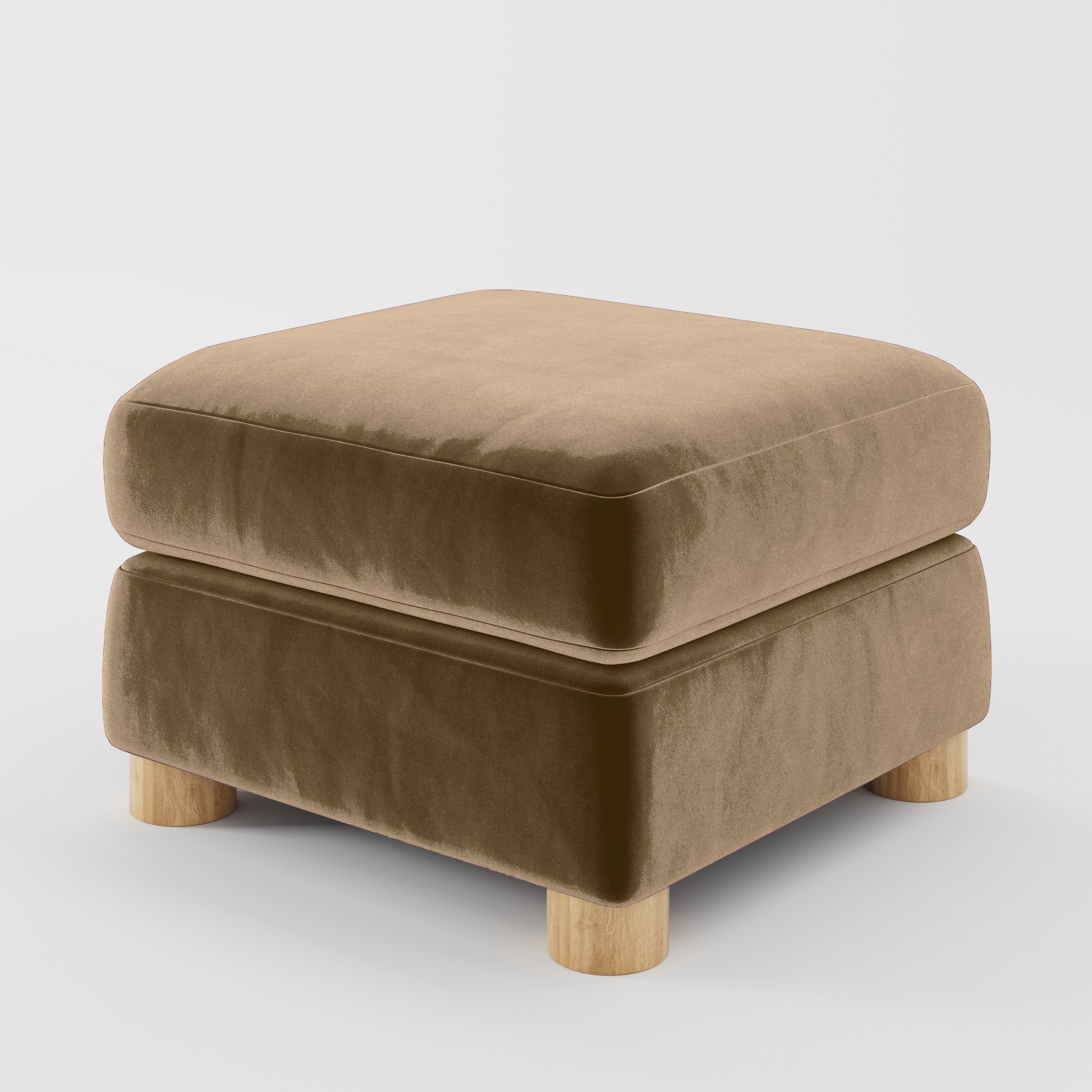 Diagonal view of the Windermere footstool upholstered in Plush EasyClean Velvet in Caribou.