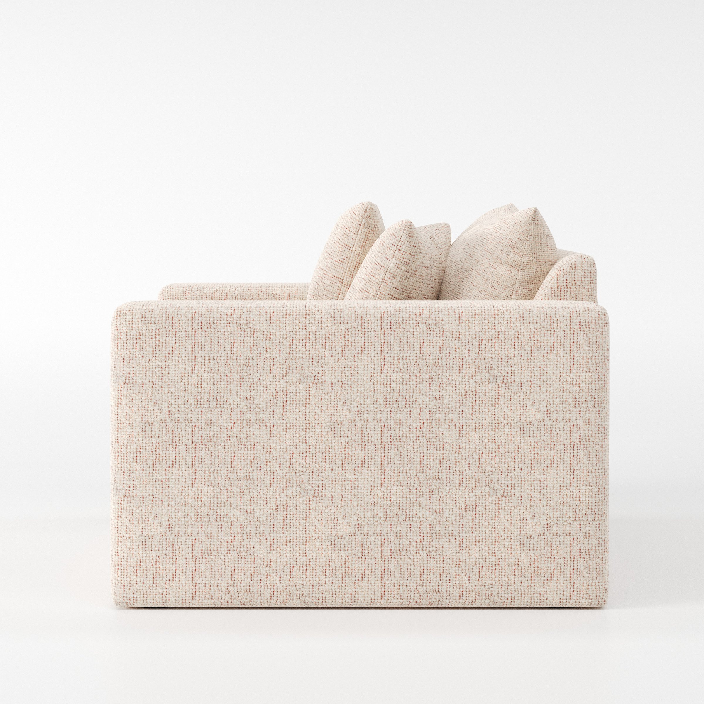 Coniston armchair in Orsay Boucle Cream and Copper shown in side profile displaying proportions and overall silhouette.