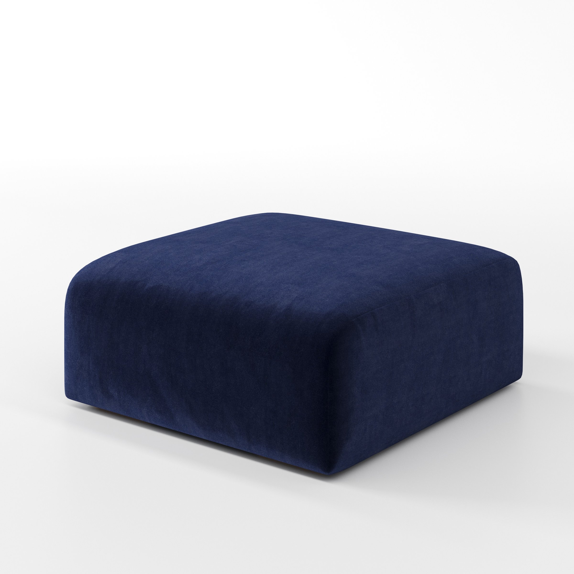 Drumquin footstool in Noss Velvet Navy shown at a diagonal angle highlighting smooth sides and minimal silhouette.