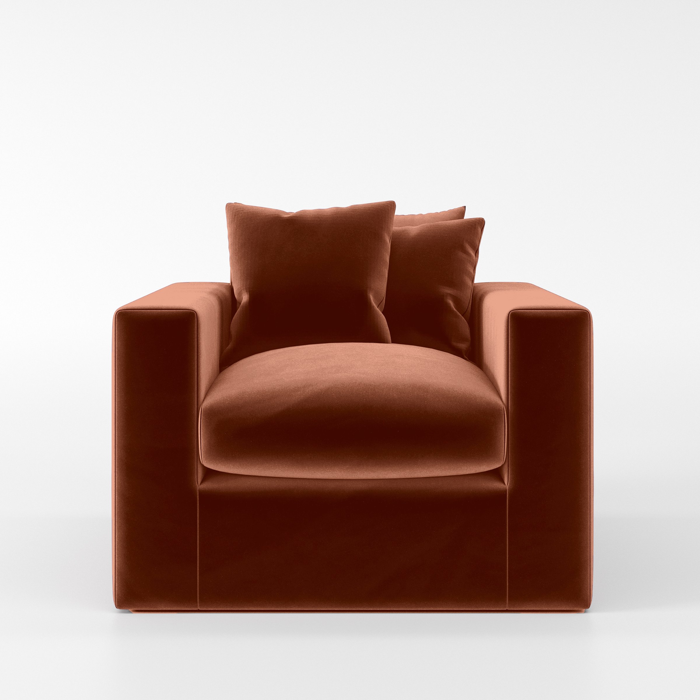 Front view of the Coniston armchair upholstered in Plush EasyClean Velvet in Apricot.