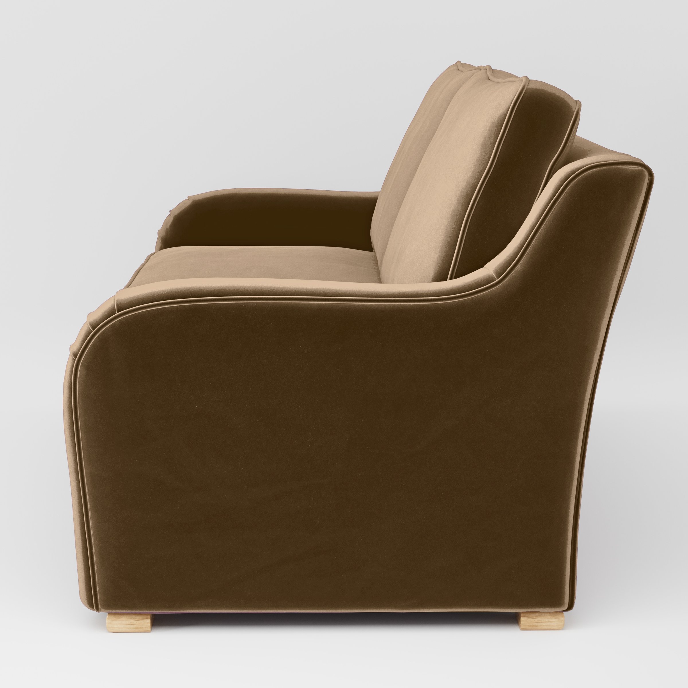 Side view of the Cashel sofa upholstered in Plush EasyClean Velvet in Caribou.