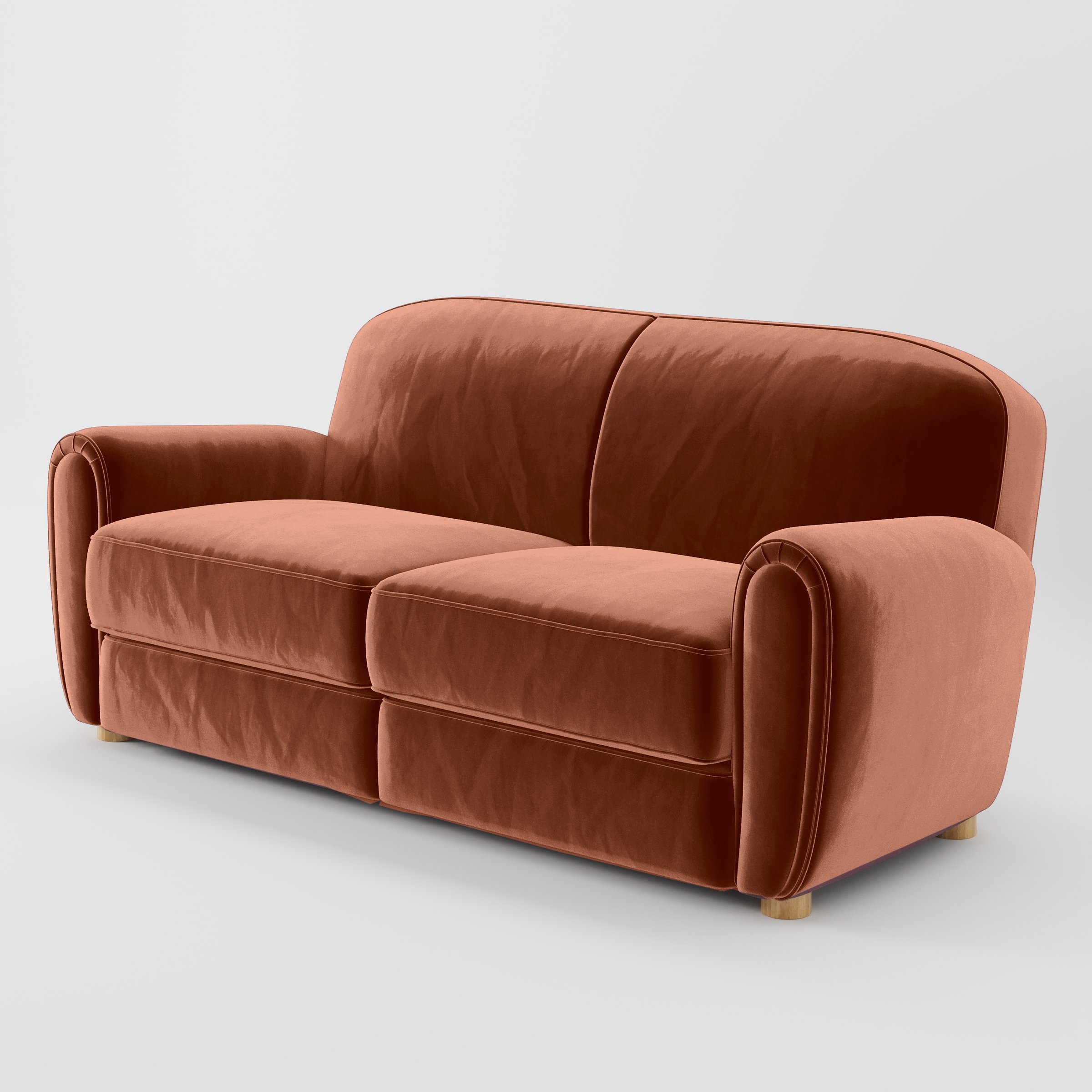 Diagonal view of the Fergus sofa upholstered in Plush EasyClean Velvet in Apricot.