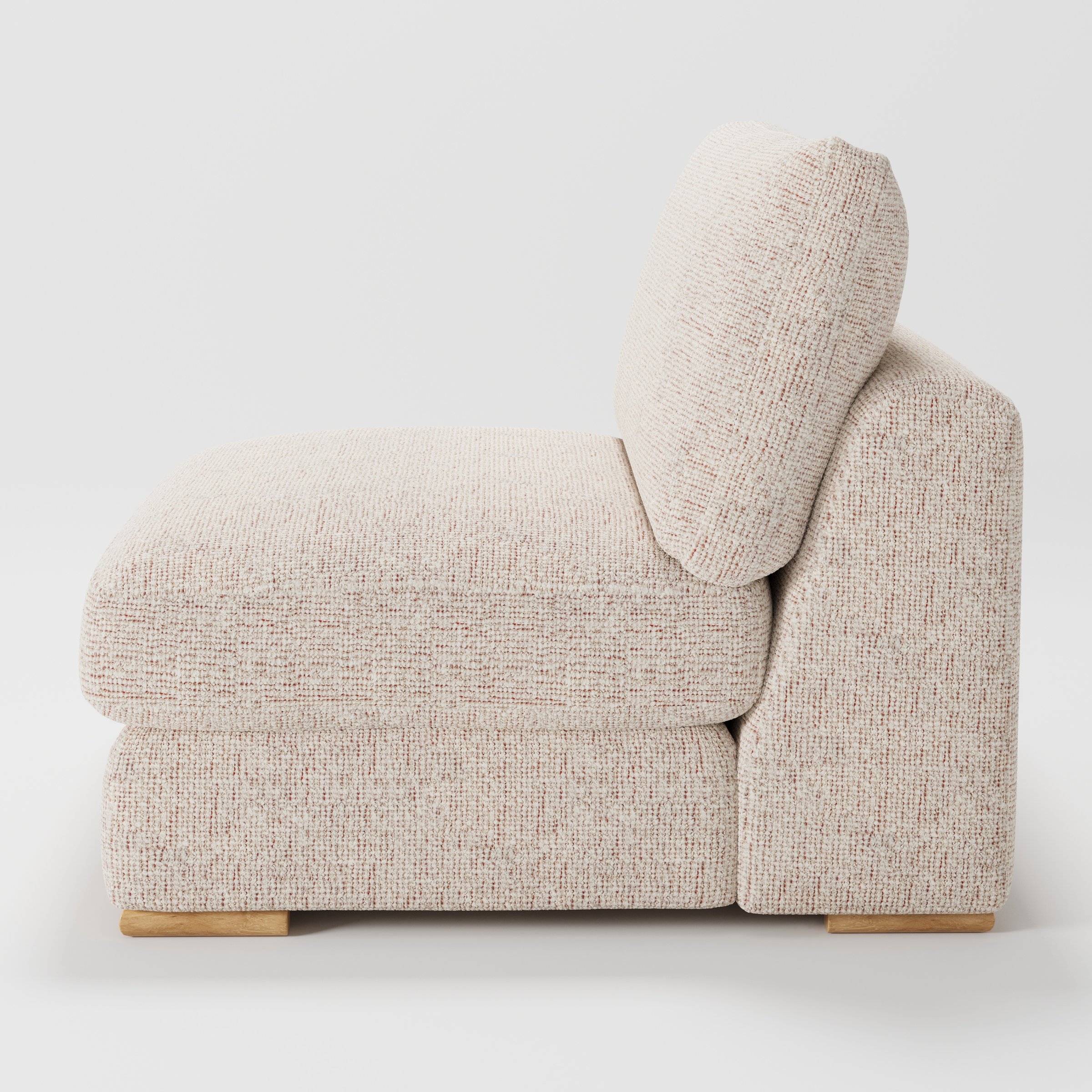 Olton single sofa unit in Orsay Bouclé Cream and Copper shown from the side showing the layered seat cushion and angled back cushion with timber feet.