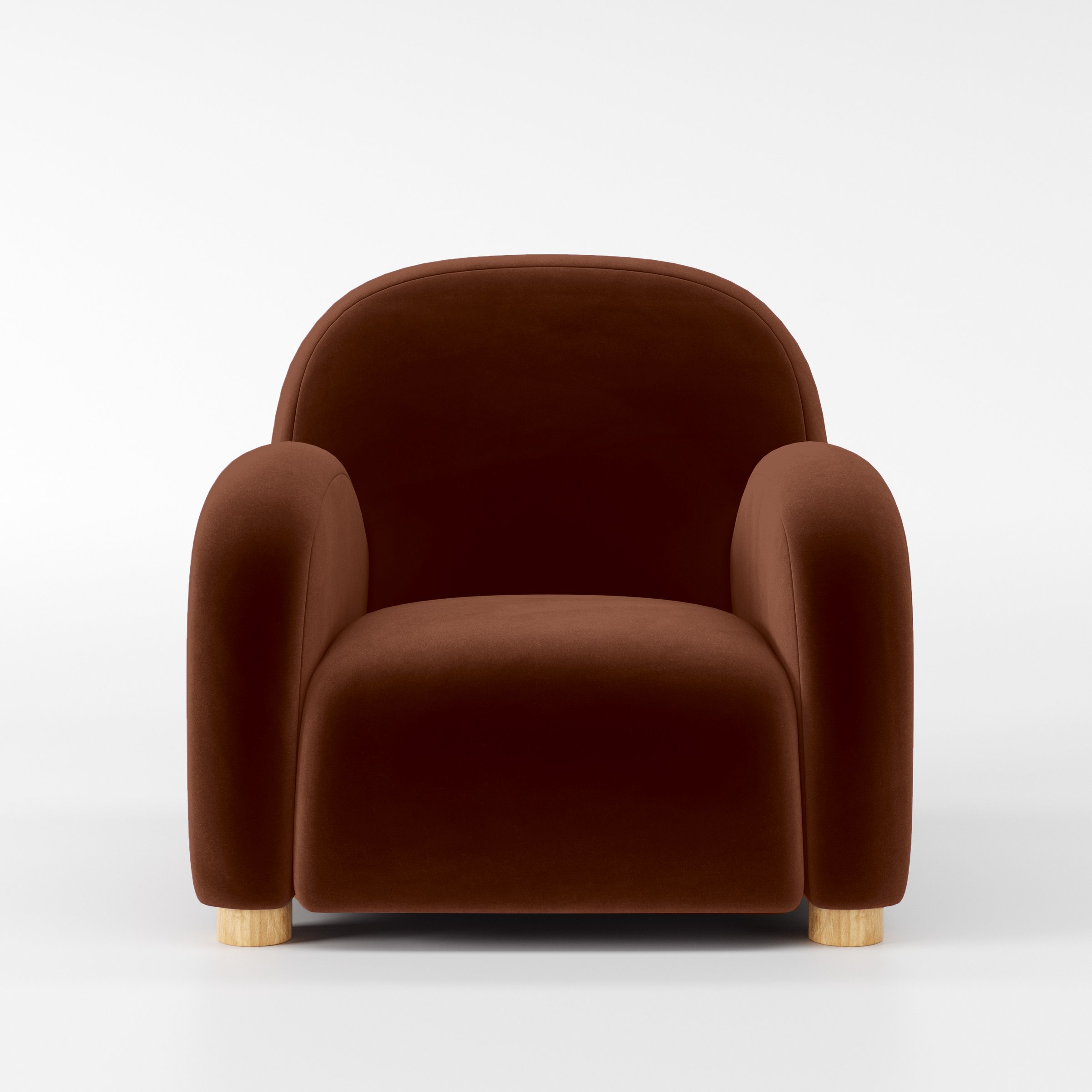 Front view of the Awe armchair upholstered in Plush EasyClean Velvet in Maple.