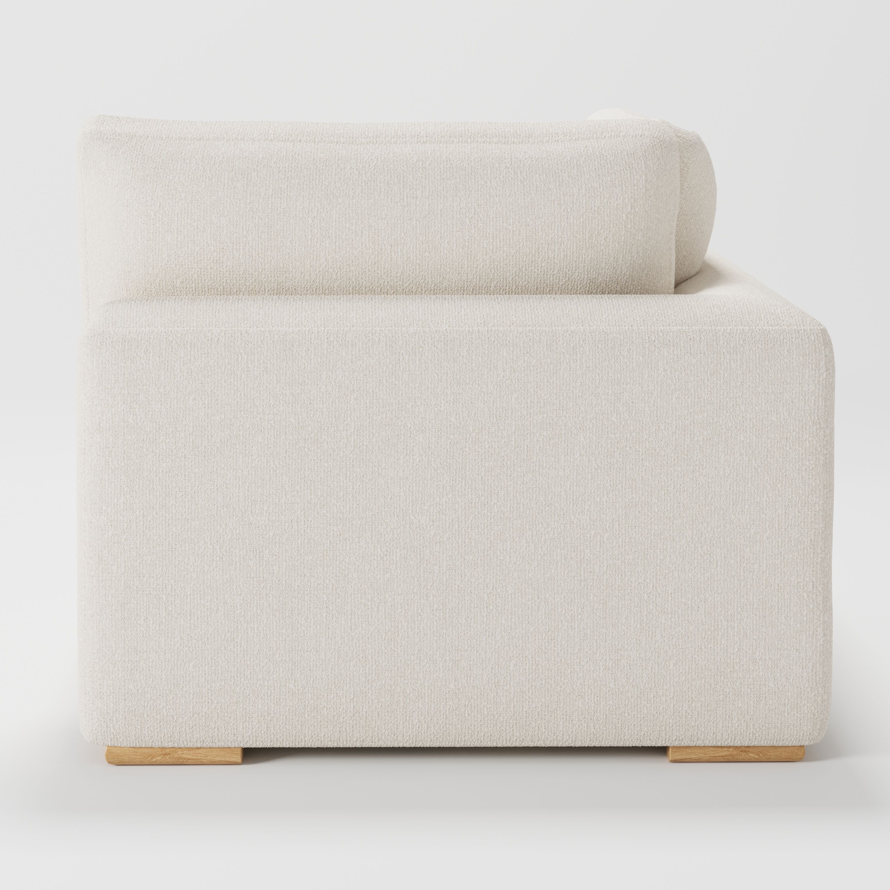 Olton corner unit in Kilda bouclé cream fabric, back view showing clean lines and full upholstery