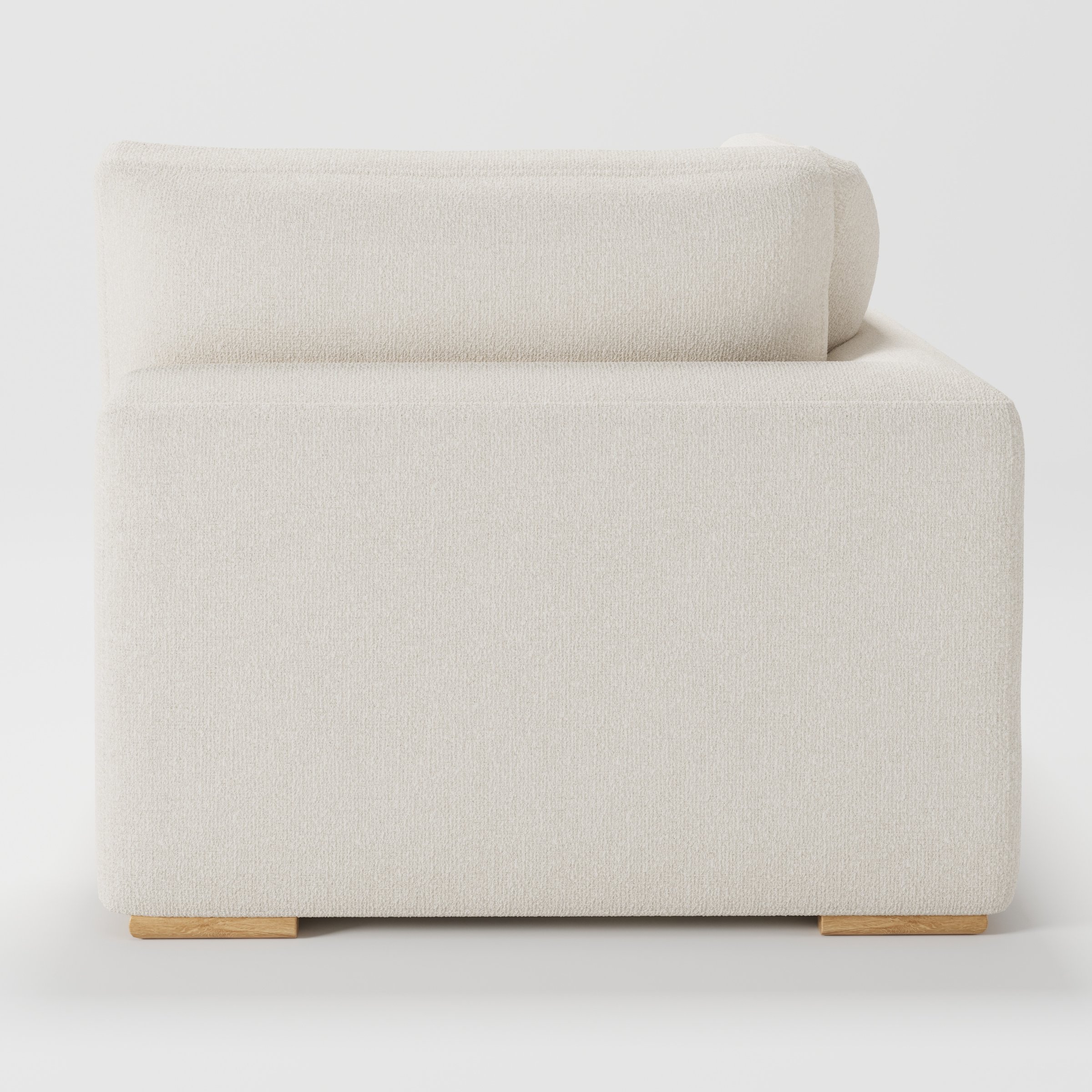 Olton corner unit in Kilda bouclé cream fabric, back view showing clean lines and full upholstery