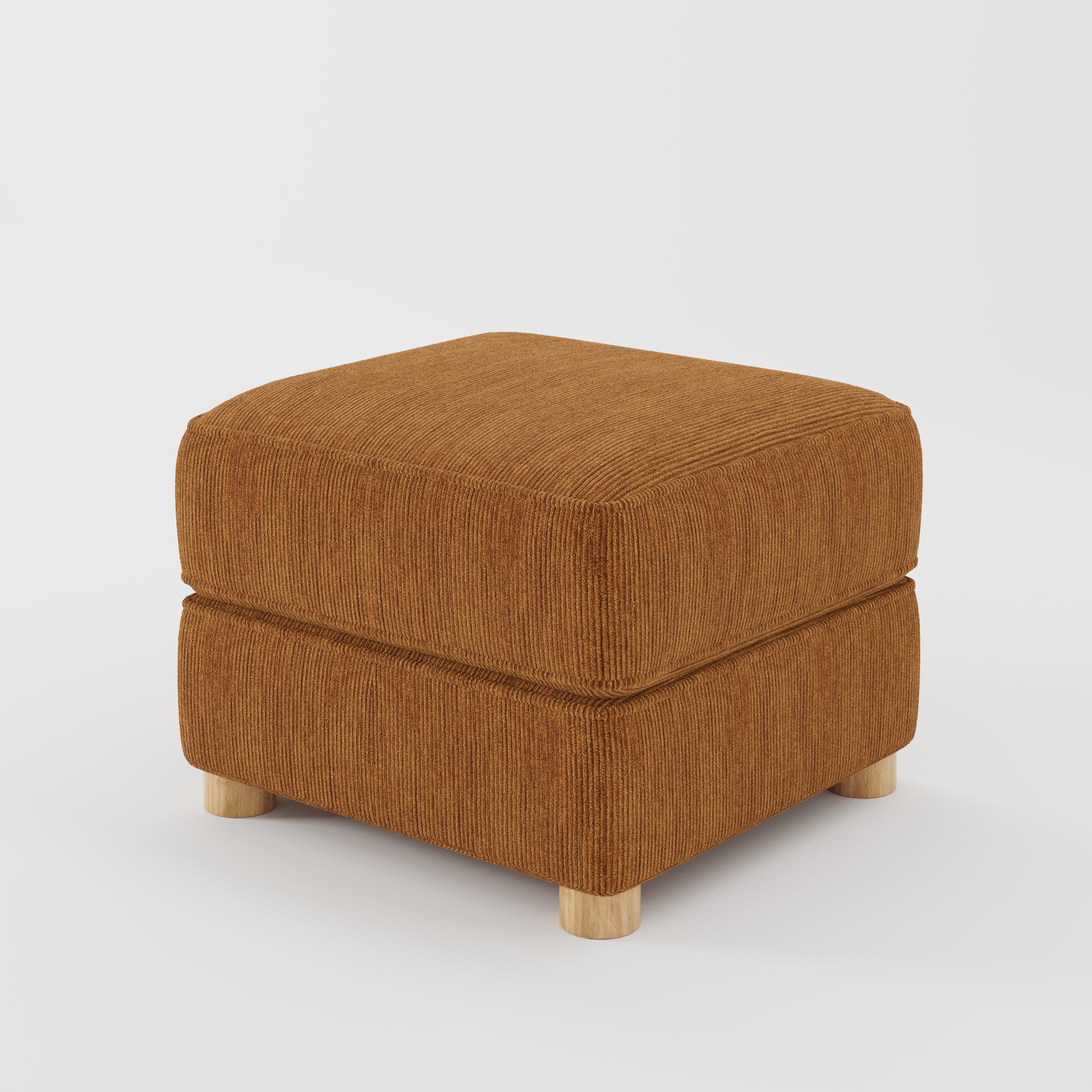 Fergus footstool in Caldey Velvet Corduroy Tobacco shown at a diagonal angle highlighting compact proportions and rounded wooden feet.