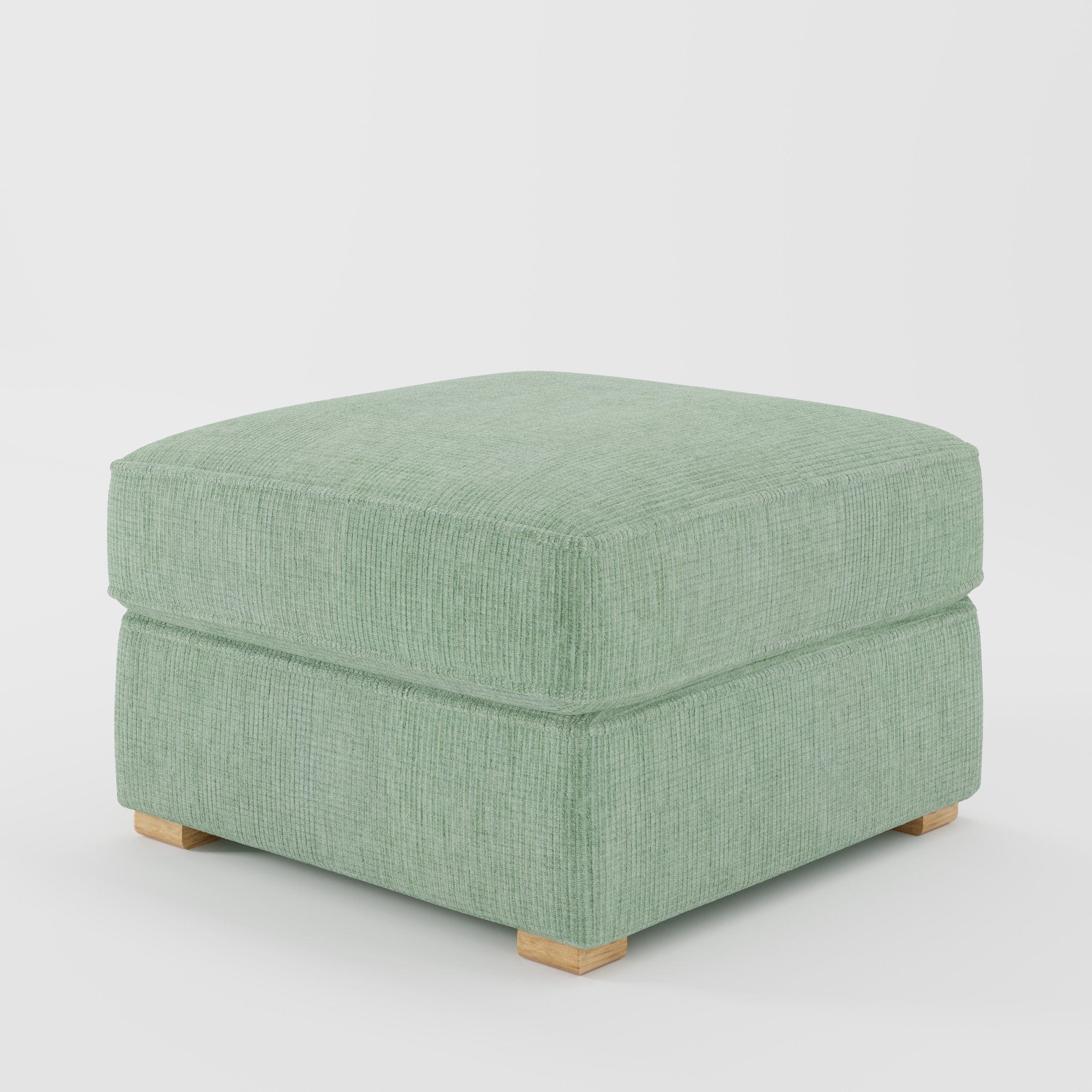 Cashel footstool in Caldey Velvet Corduroy Eucalyptus shown at a diagonal angle highlighting layered cushioning and low wooden feet.