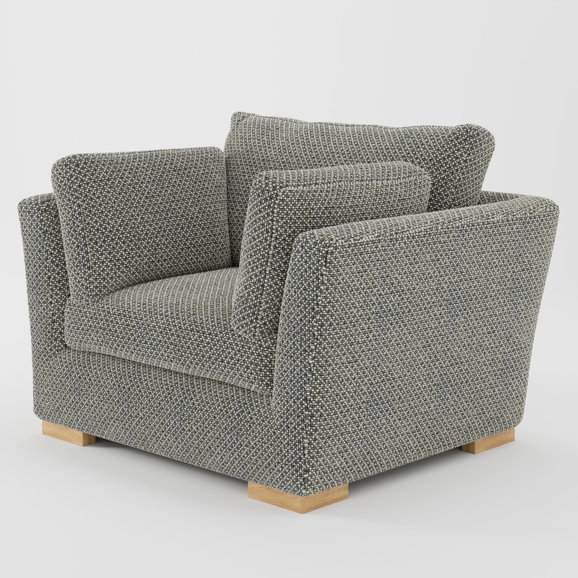 Stowe armchair in Rousay Wool Blend Tar and Chalk shown at a diagonal angle highlighting splayed arms and seat depth.