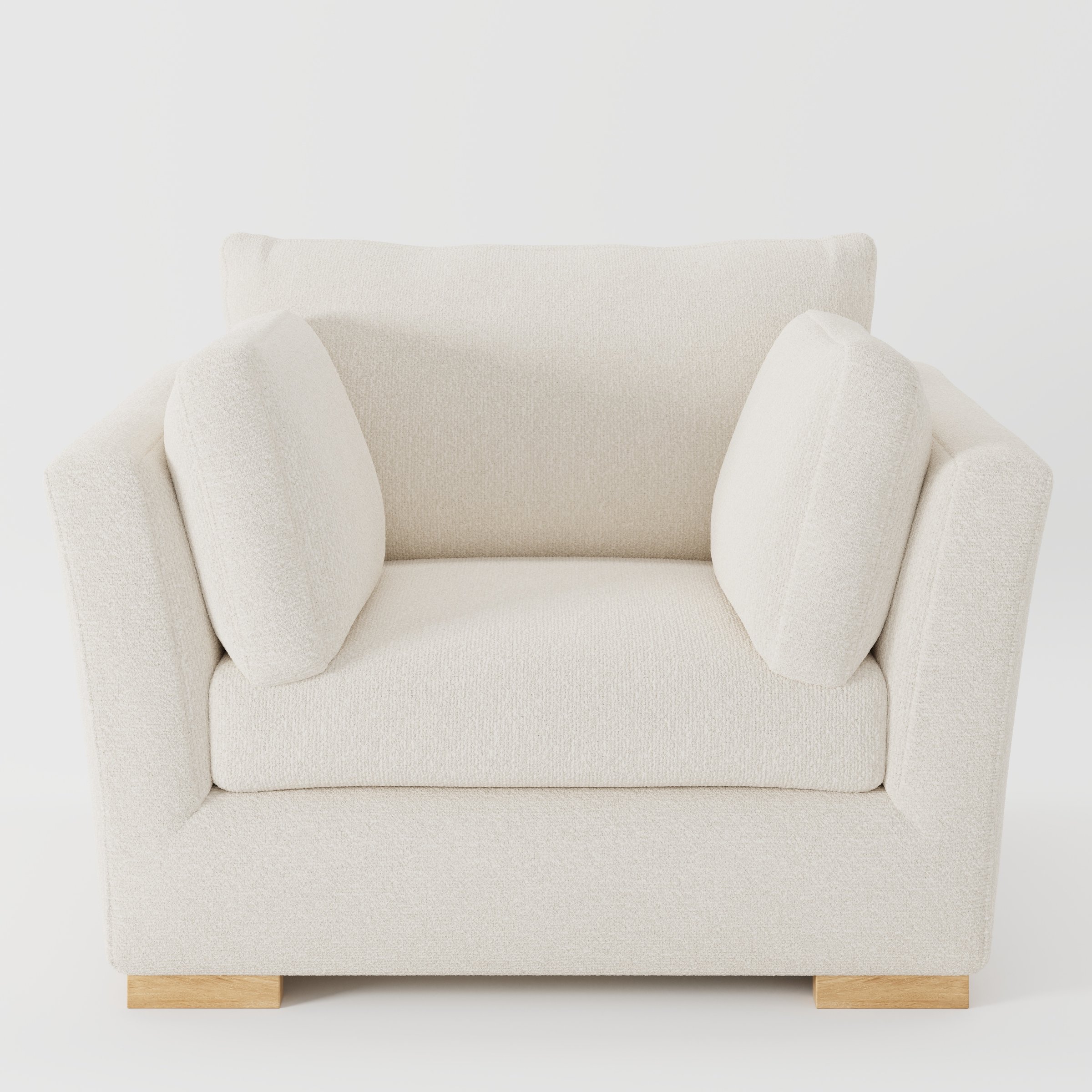 Stowe armchair in Kilda Boucle Cream shown front-on against a neutral studio backdrop.