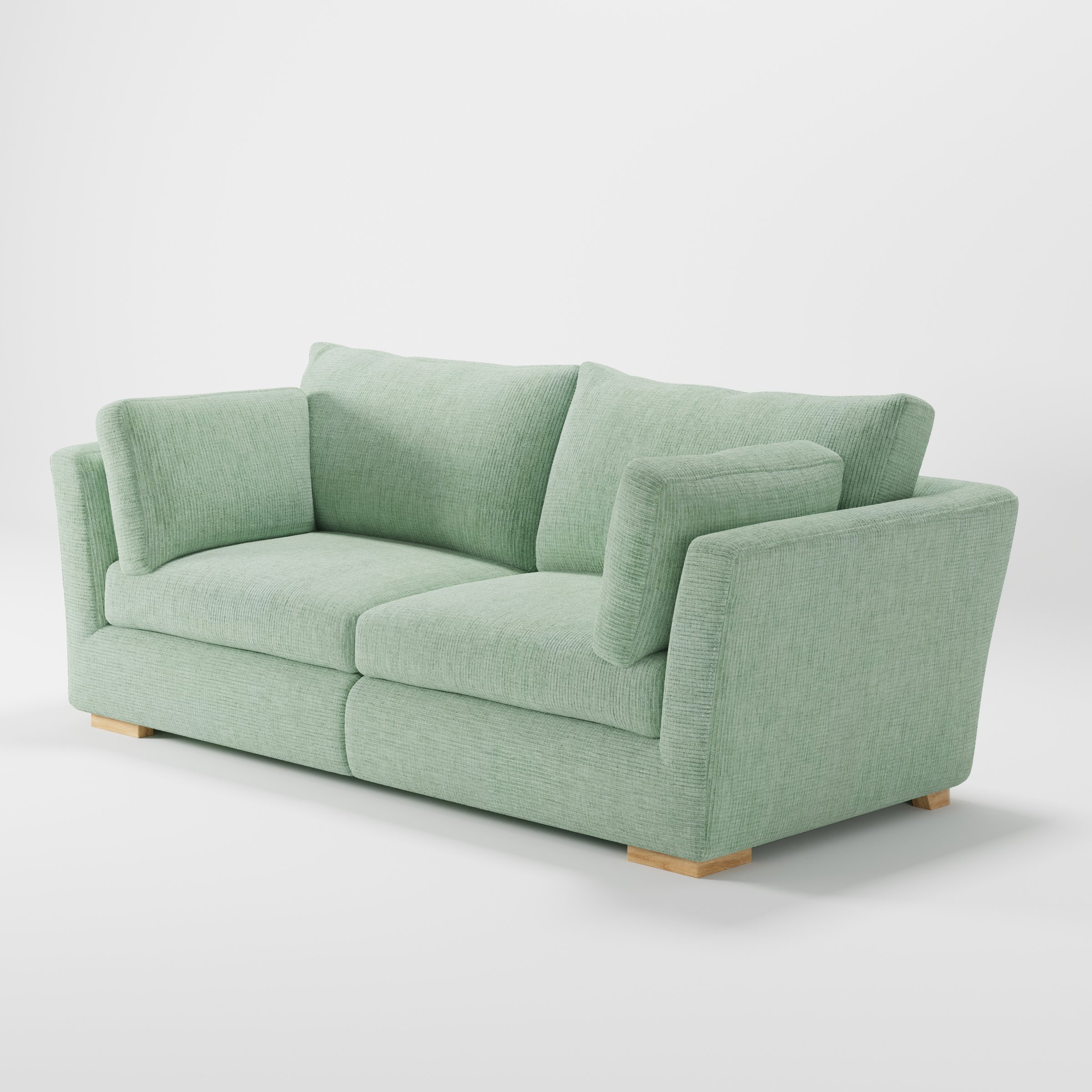 Stowe sofa in Caldey Velvet Corduroy Eucalyptus shown at a diagonal angle highlighting arm profile and seat depth.