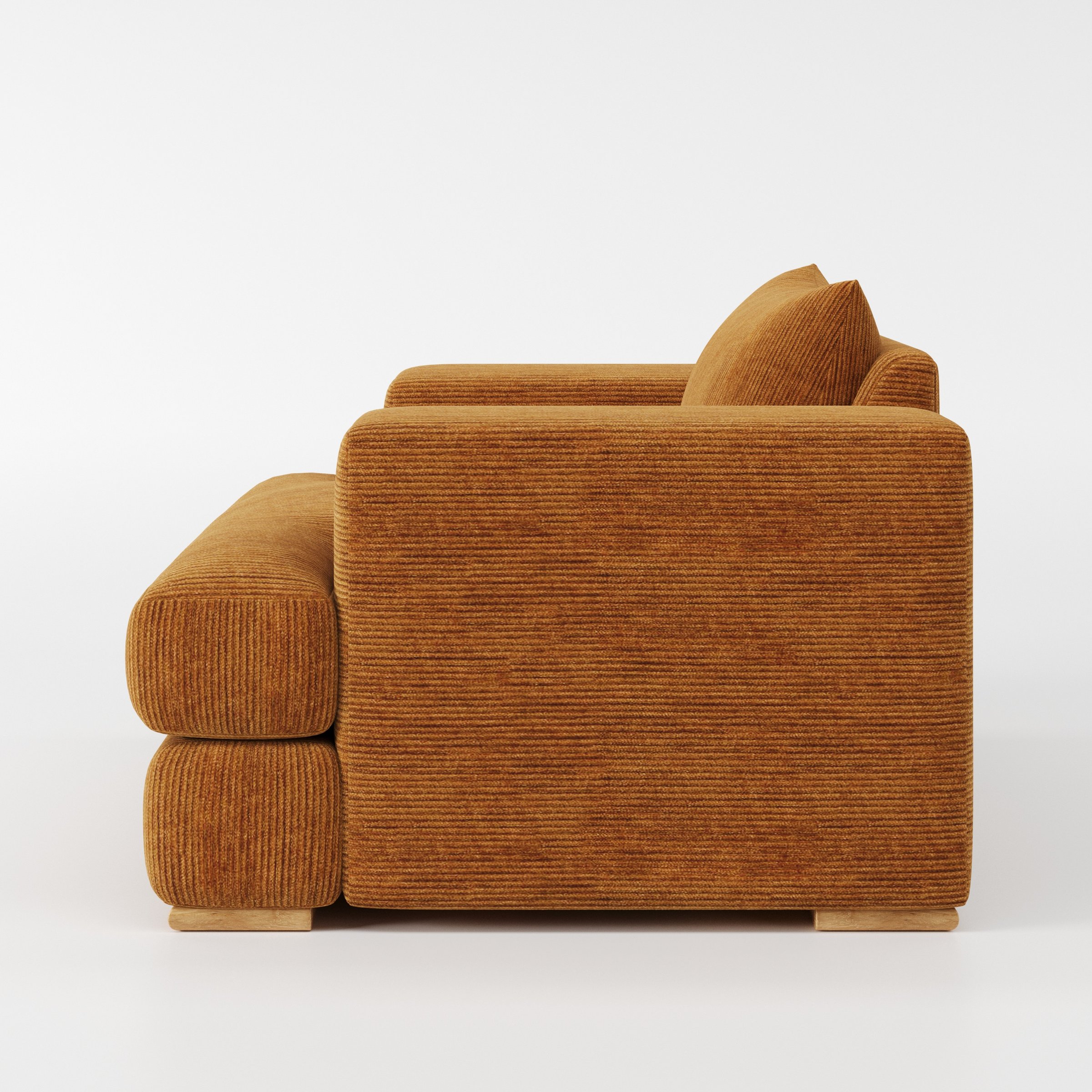 Fane armchair in Caldey Velvet Corduroy Tobacco shown in side profile displaying proportions and overall silhouette.