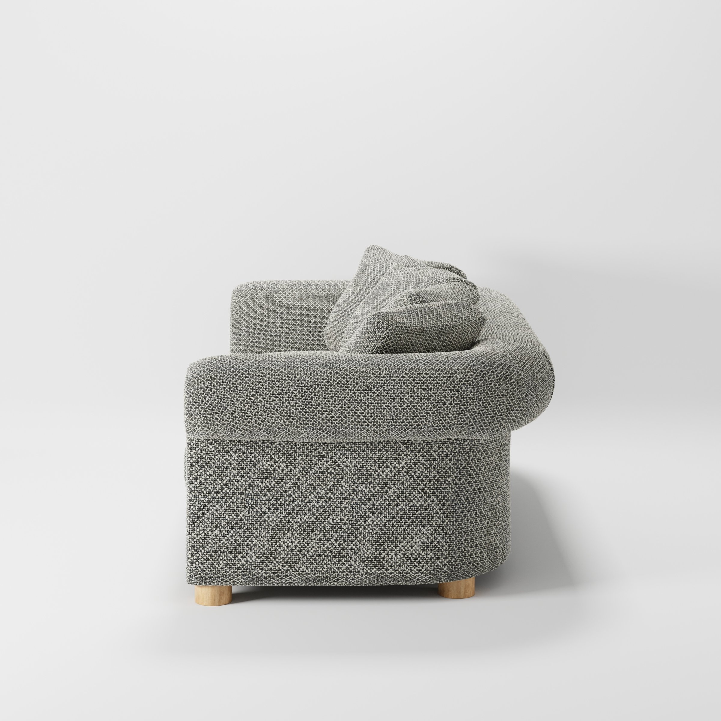 Windermere sofa in Rousay Wool Blend Tar and Chalk shown in side profile displaying proportions and overall silhouette.
