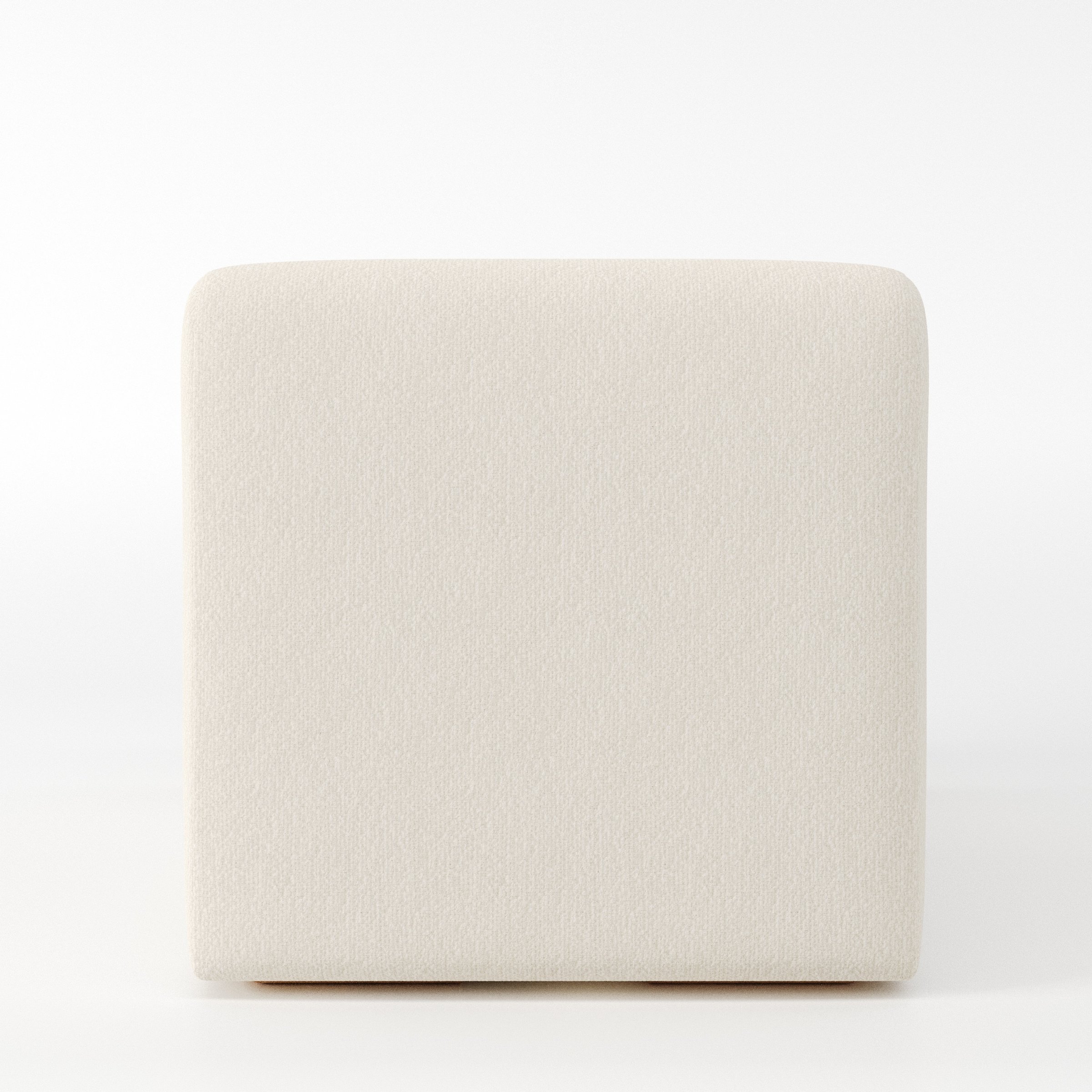 Drumquin modular sofa single unit in Kilda Bouclé Cream shown from the back with a smooth, softly curved silhouette.