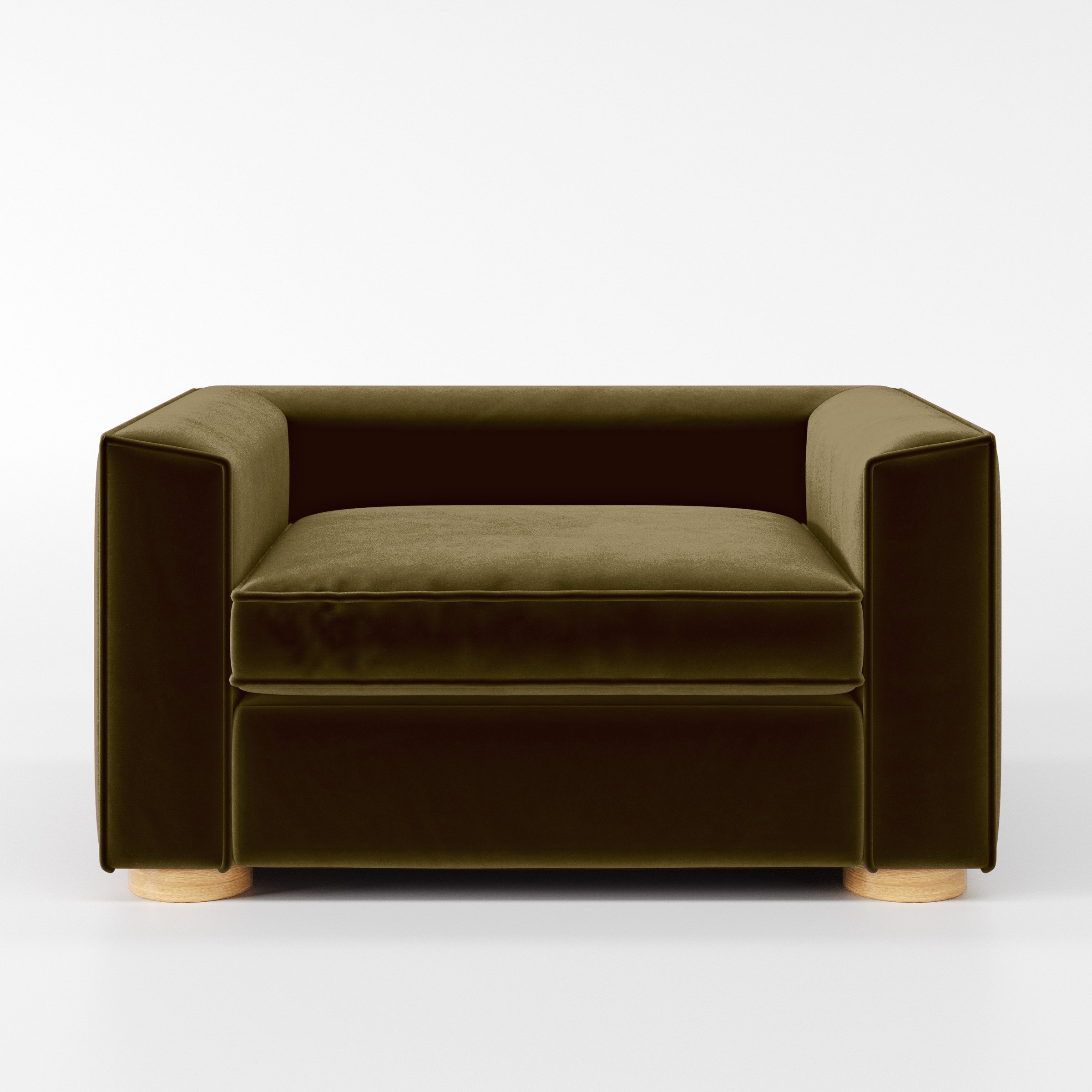 Front view of the Feale armchair upholstered in Plush EasyClean Velvet in Cedar.