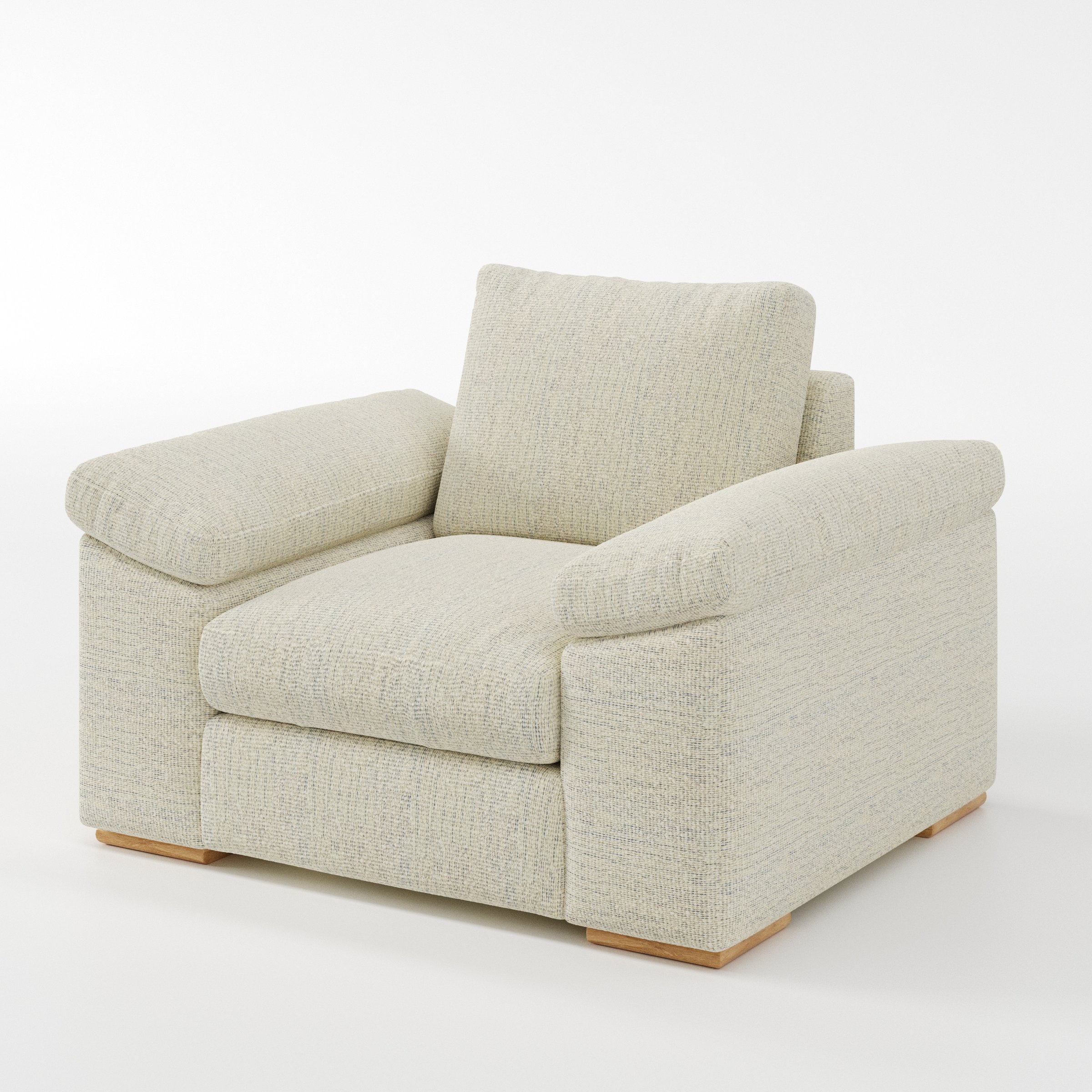 Moy armchair in Orsay Boucle Cream and Marine shown at a diagonal angle highlighting arms and seat depth.