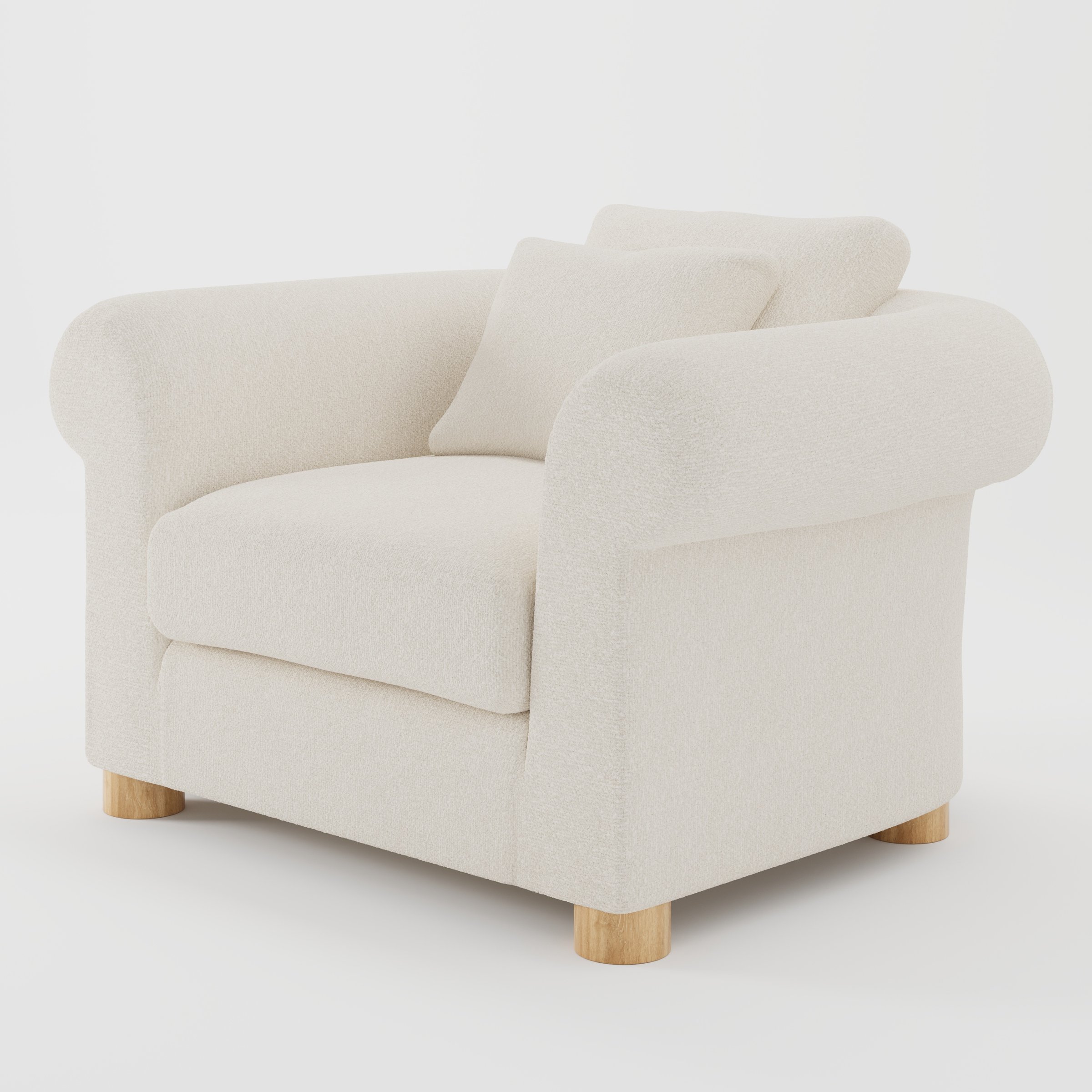 Windermere armchair in Kilda Boucle Cream shown at a diagonal angle highlighting rounded arms and relaxed seat depth.