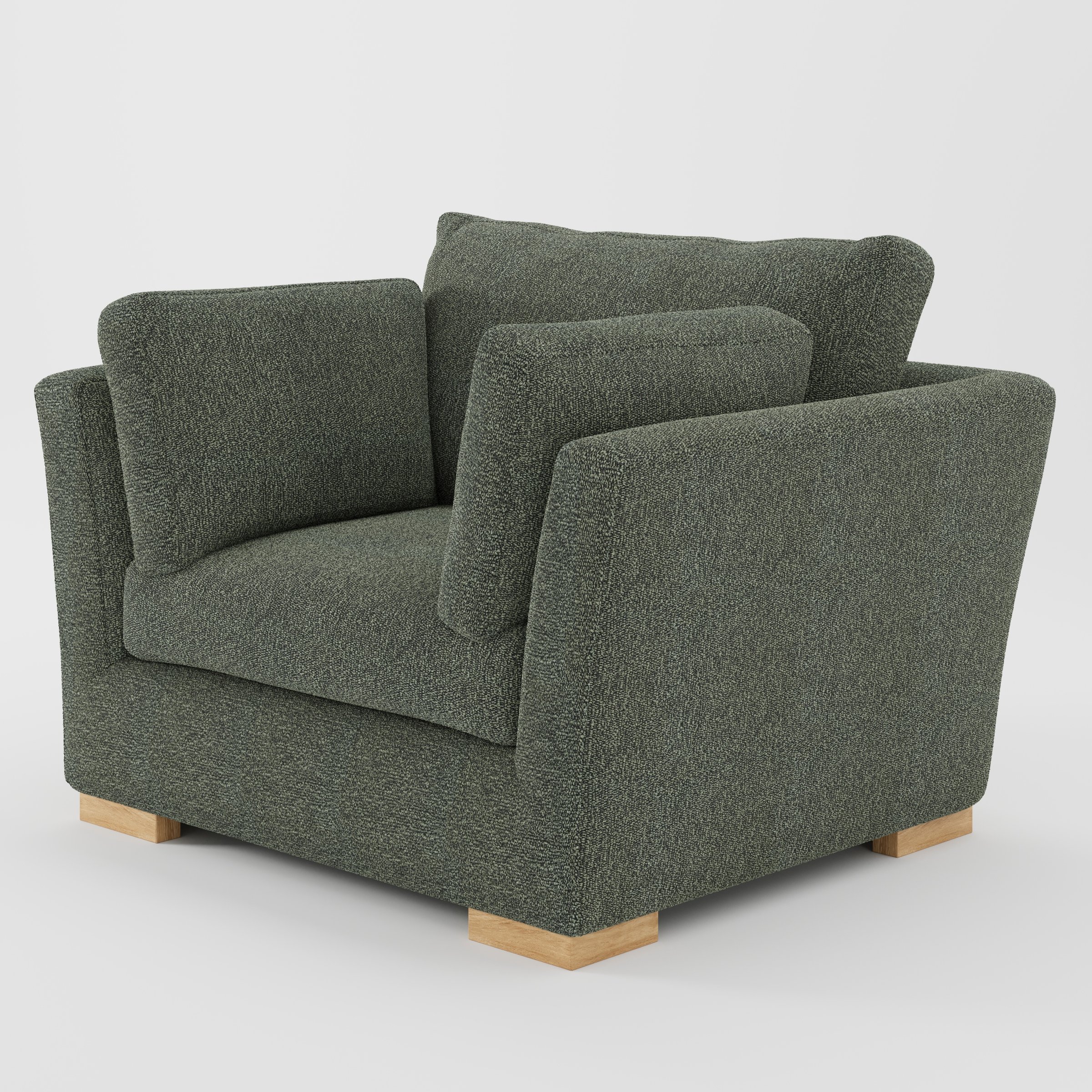 Stowe armchair in Kilda Boucle Moss shown at a diagonal angle highlighting splayed arms and seat depth.
