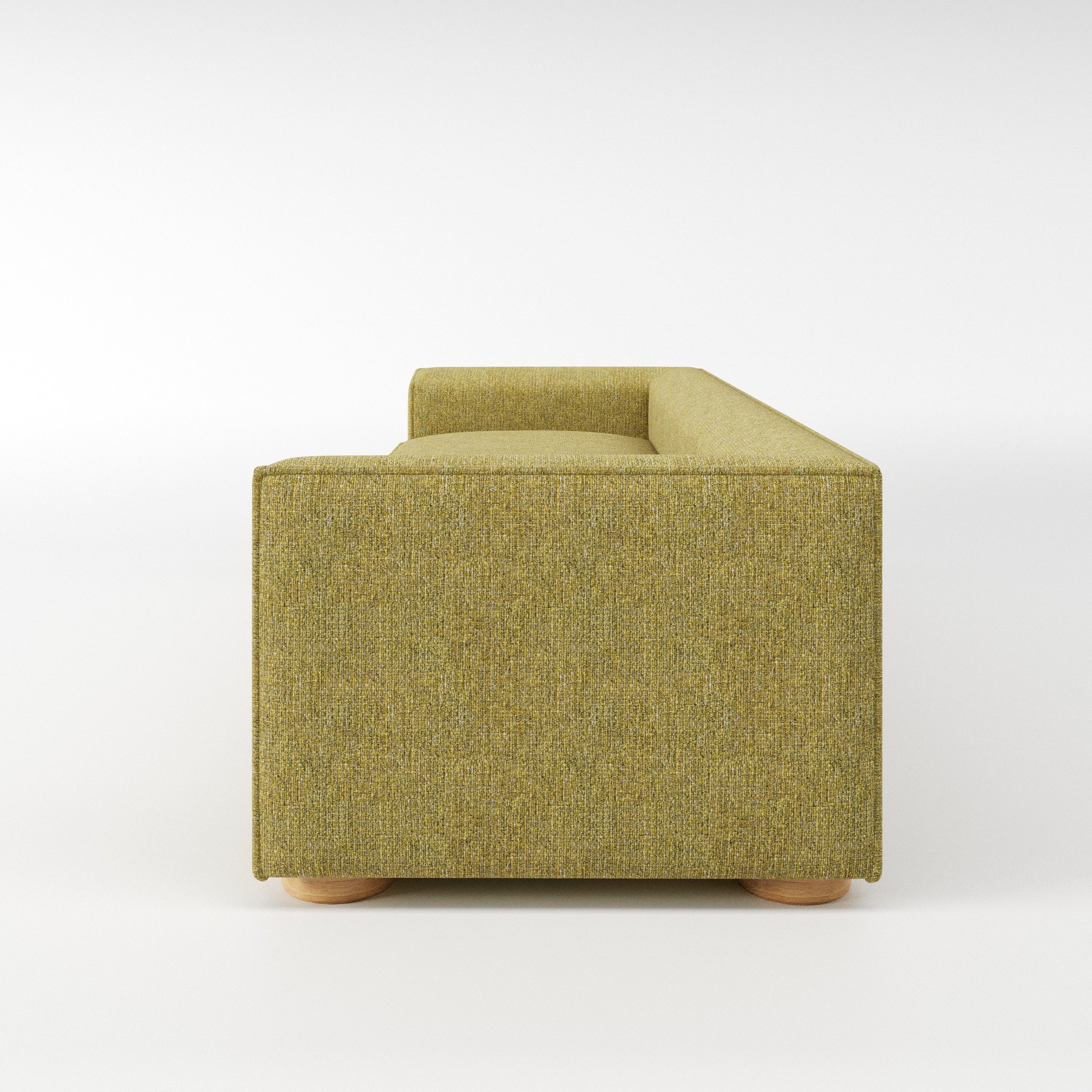 Feale sofa in Heyling Tweed Sencha shown in side profile displaying proportions and overall silhouette.