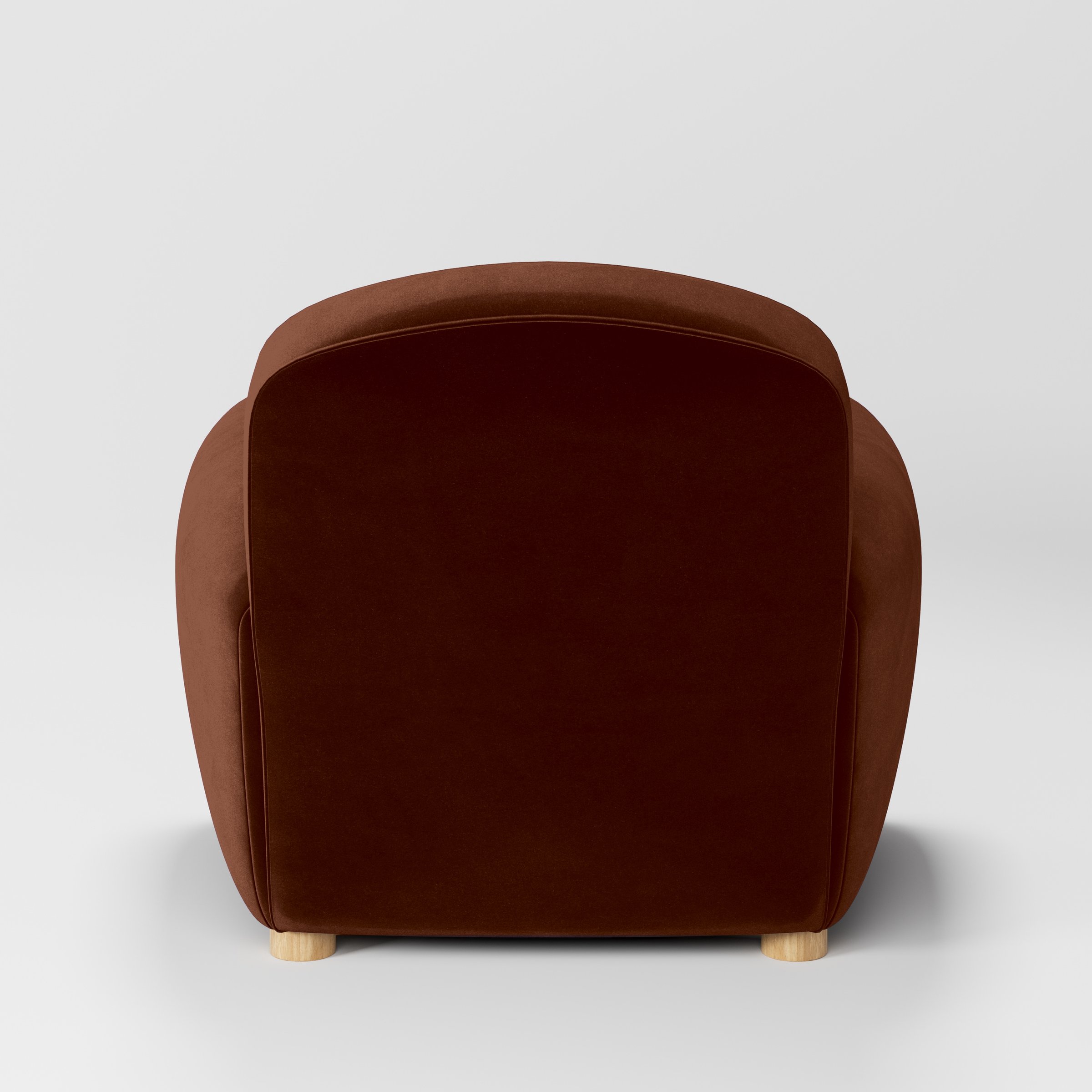 Rear view of the Fergus armchair upholstered in Plush EasyClean Velvet in Maple.
