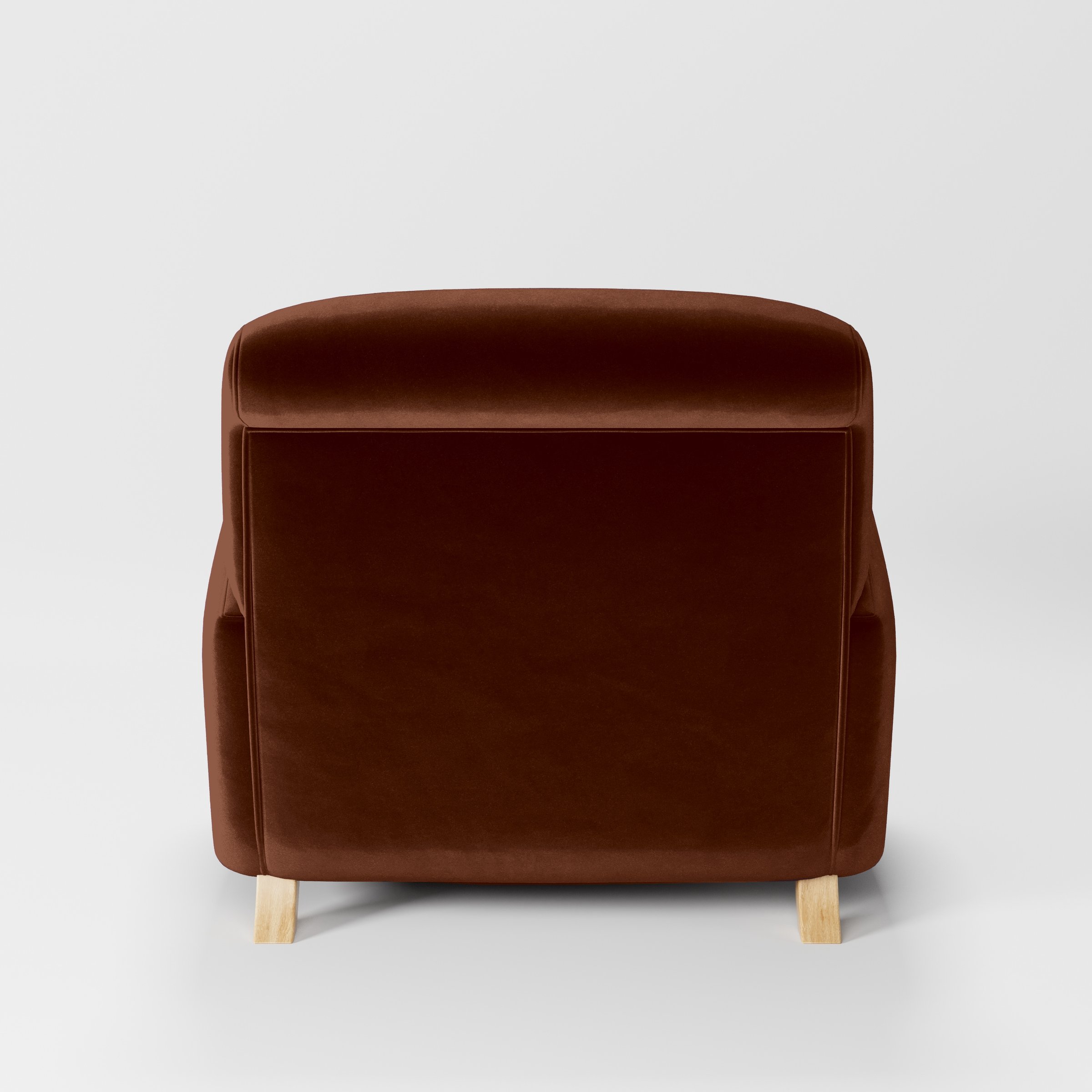 Rear view of the Rye armchair upholstered in Plush EasyClean Velvet in Maple.
