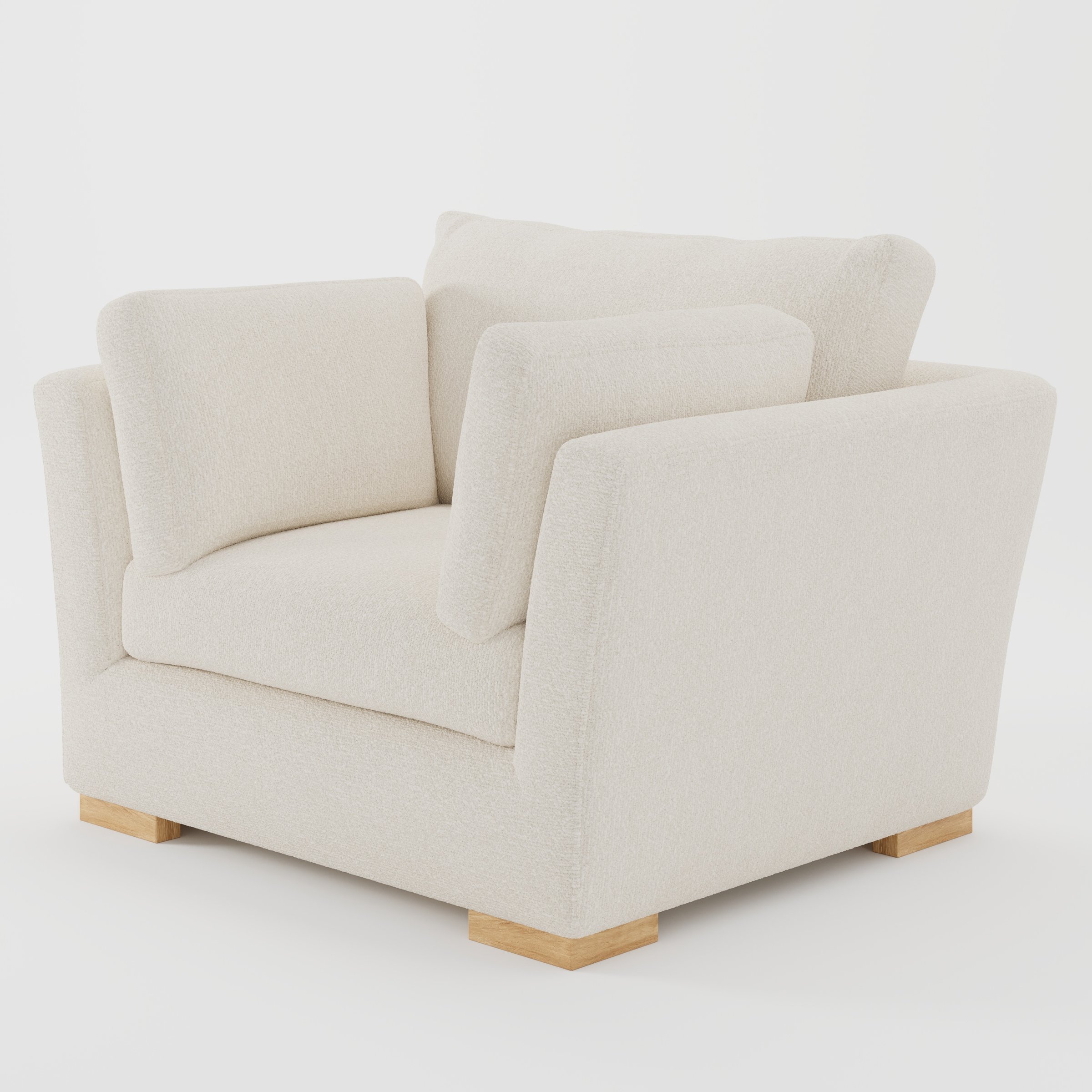 Stowe armchair in Kilda Boucle Cream shown at a diagonal angle highlighting splayed arms and seat depth.