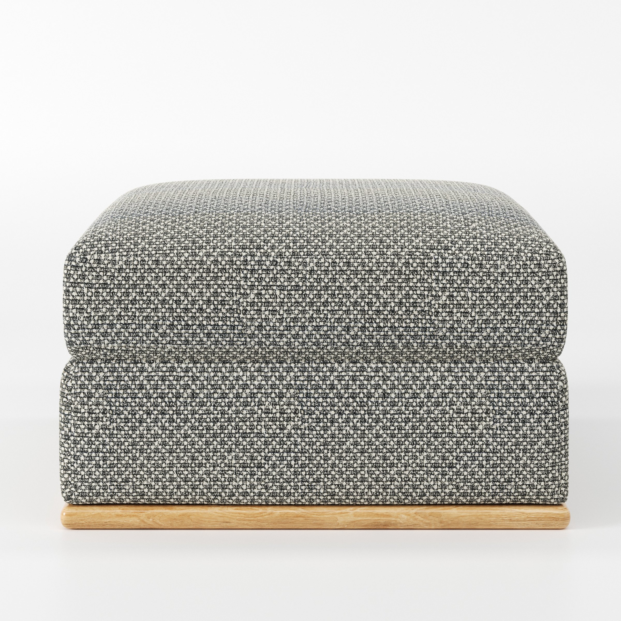 Cusher footstool in Rousay Wool Blend Tar and Chalk shown front-on against a neutral studio backdrop.