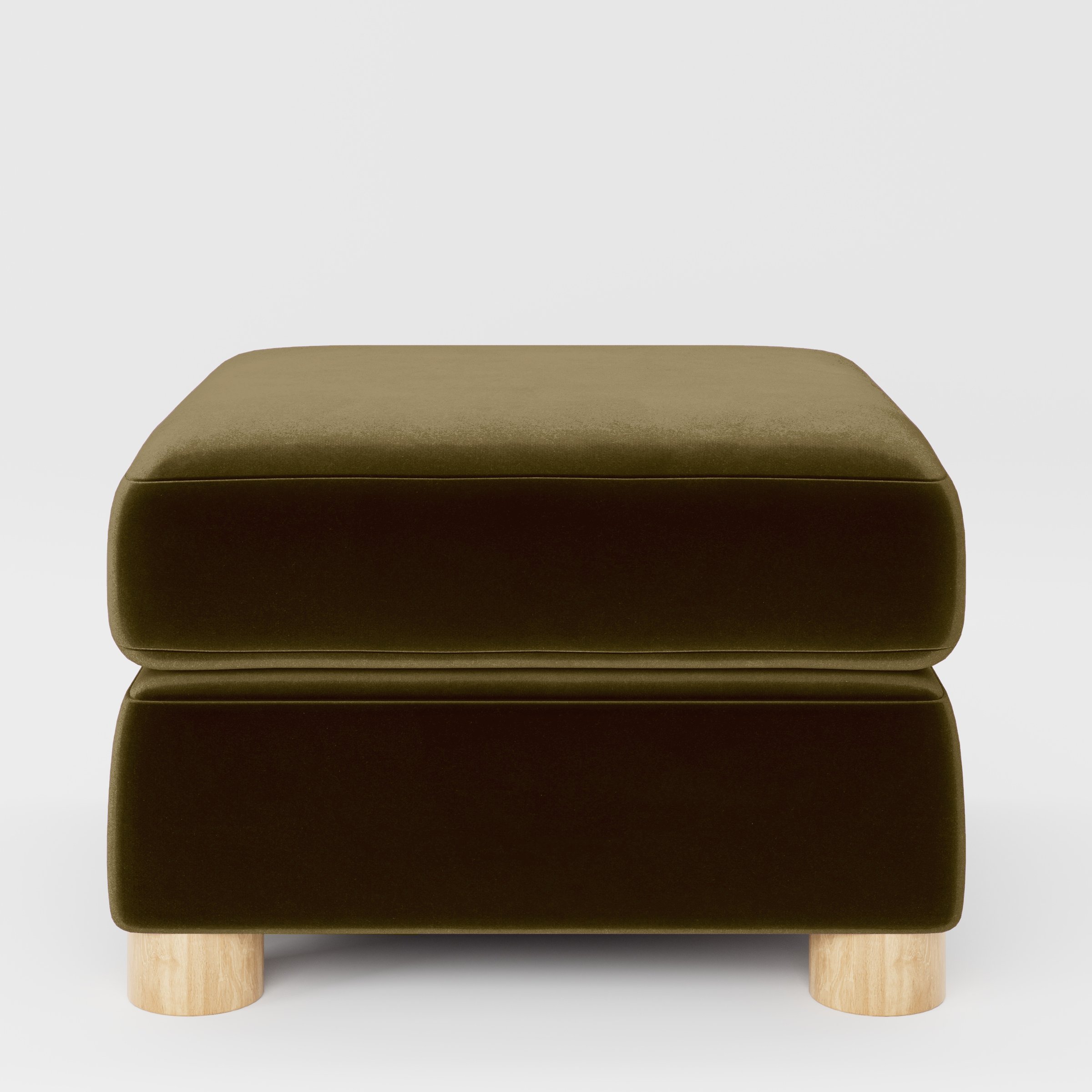 Front view of the Windermere footstool upholstered in Plush EasyClean Velvet in Cedar.