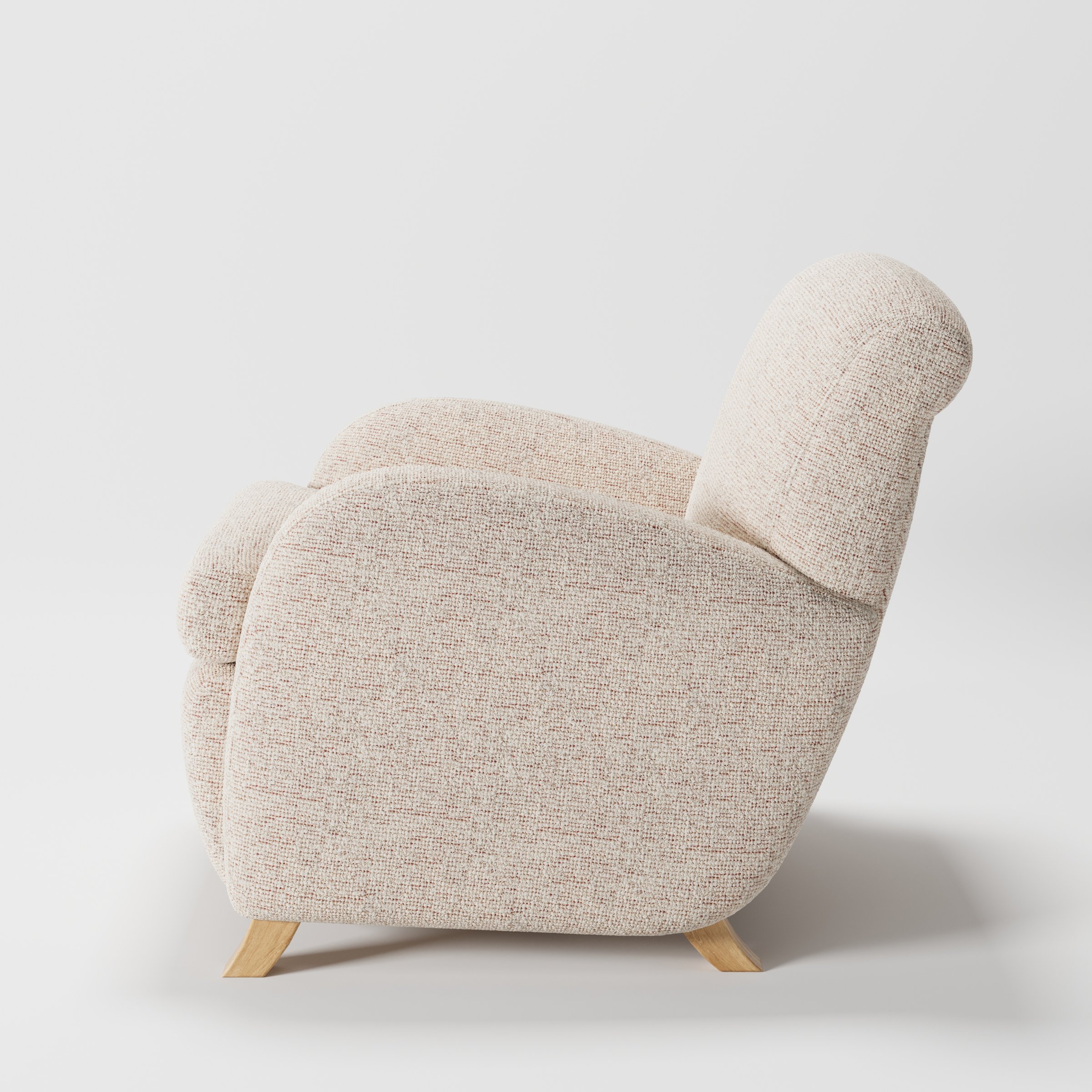 Rye armchair in Orsay Boucle Cream and Copper shown in side profile displaying proportions and overall silhouette.